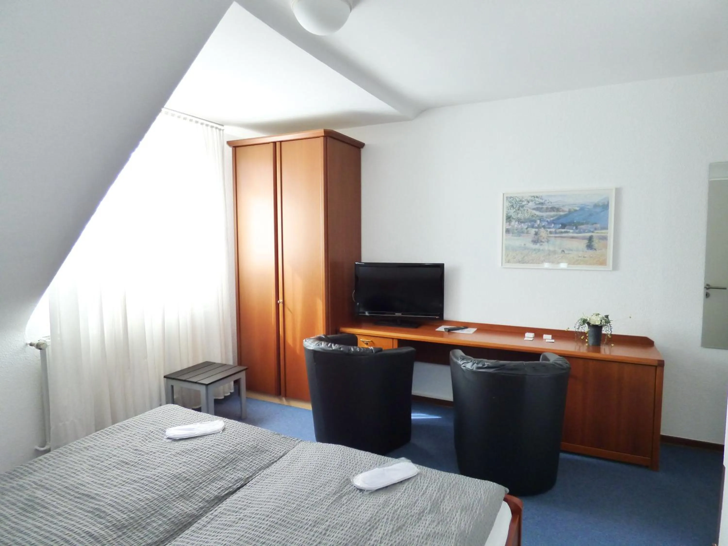 Photo of the whole room, Bed in Hotel Alt Büttgen