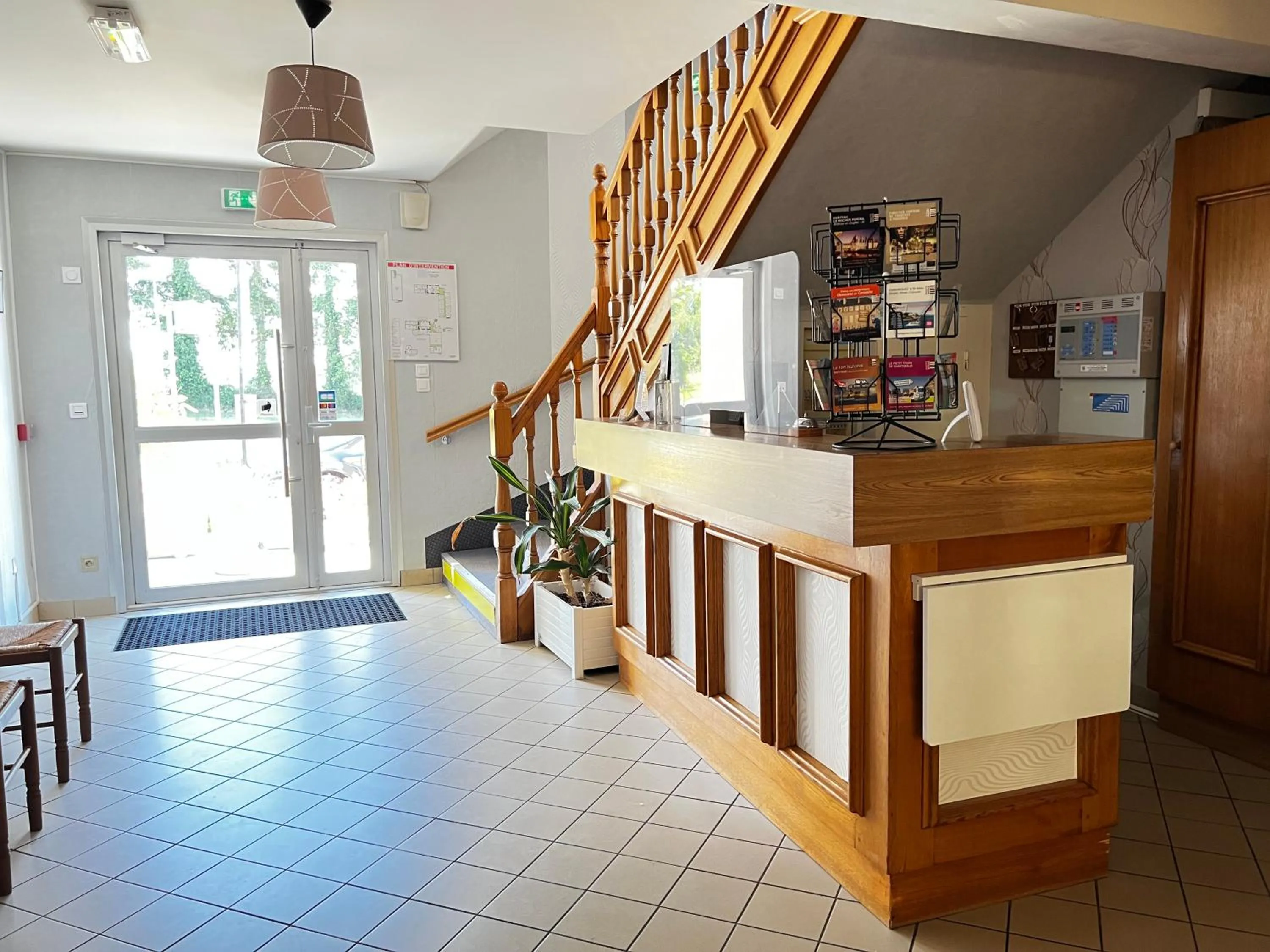 Lobby or reception in Contact Hotel Les Montois