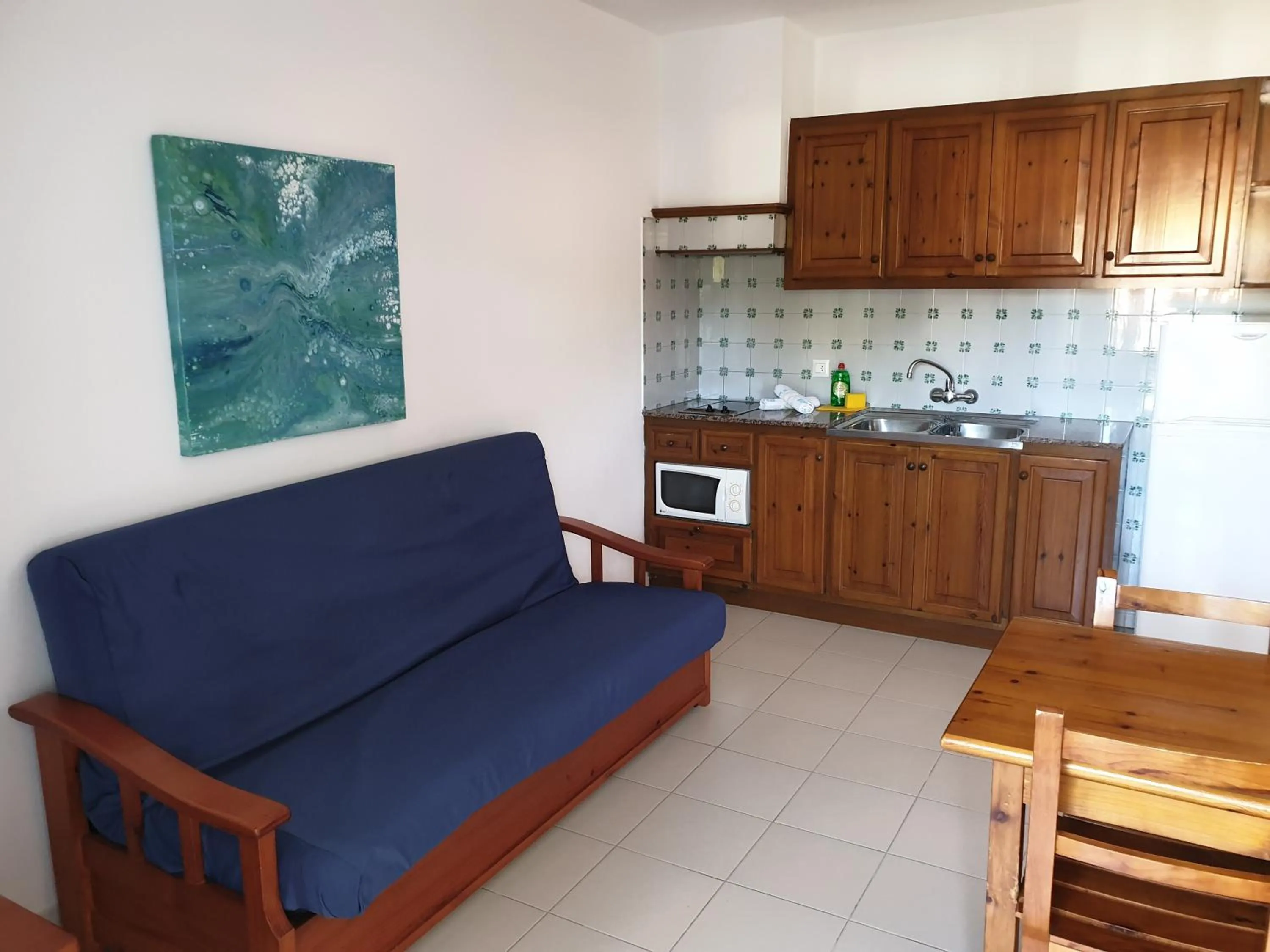 Kitchen or kitchenette in Apartamentos Piscis