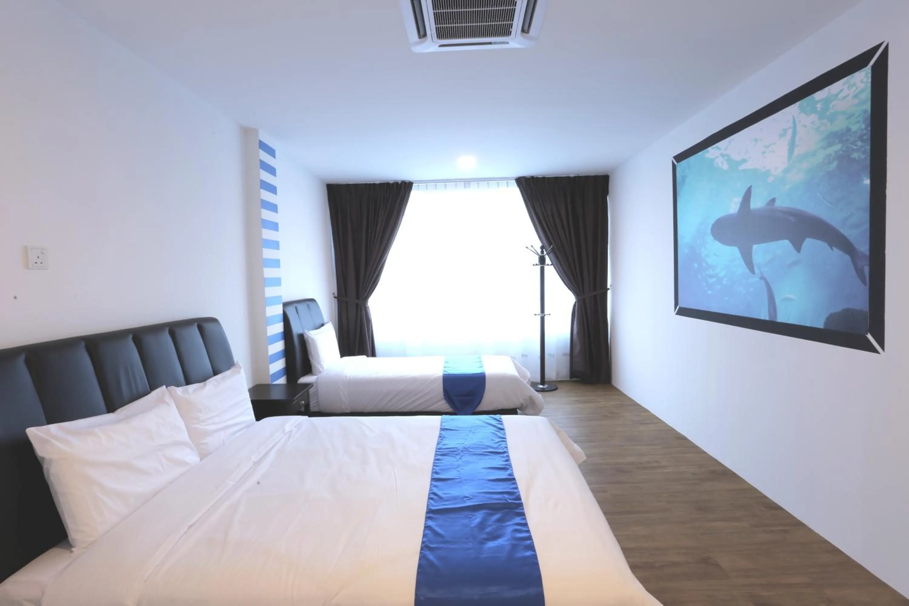 Bed in Hard Rock VIP Guest House