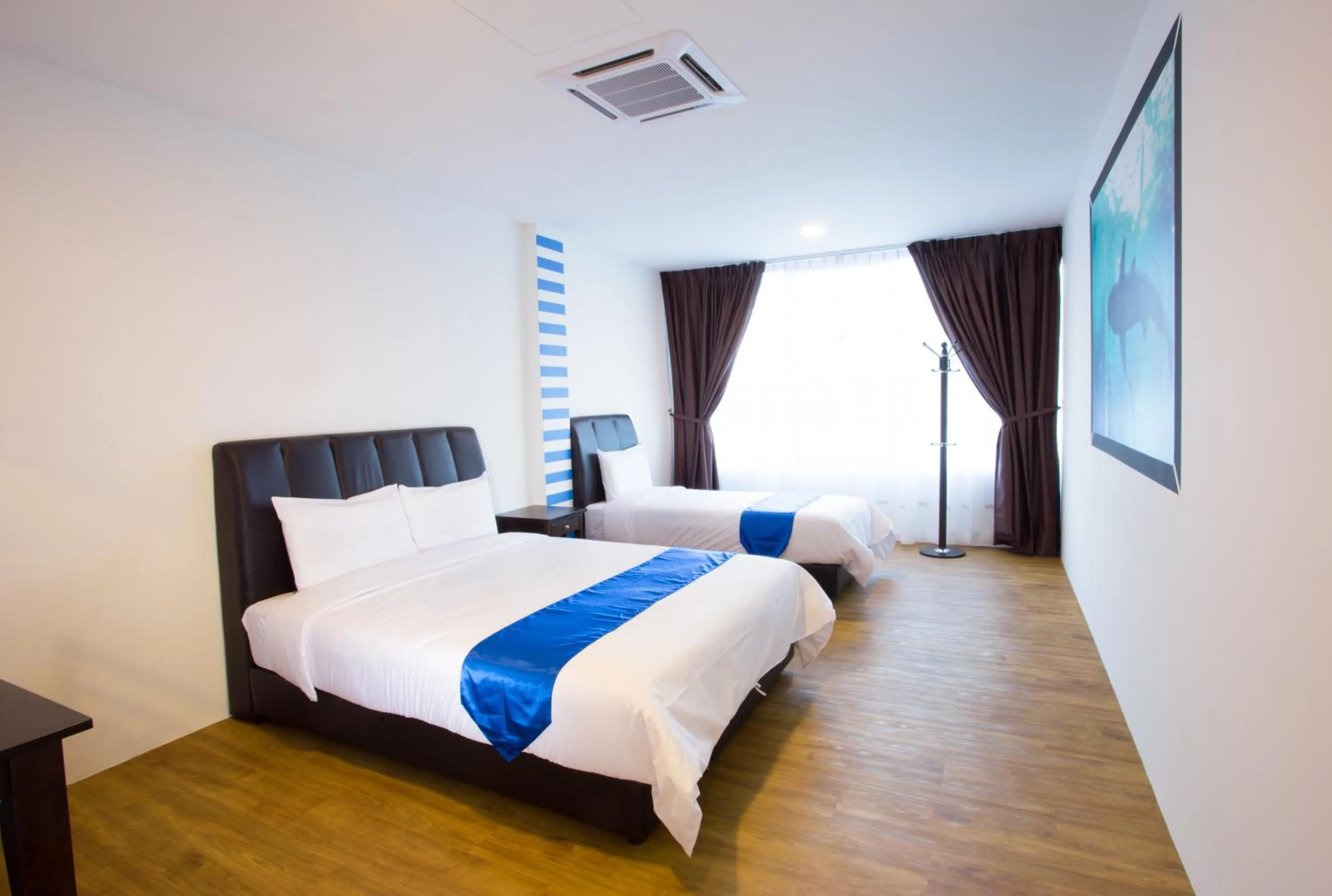 Bed in Hard Rock VIP Guest House