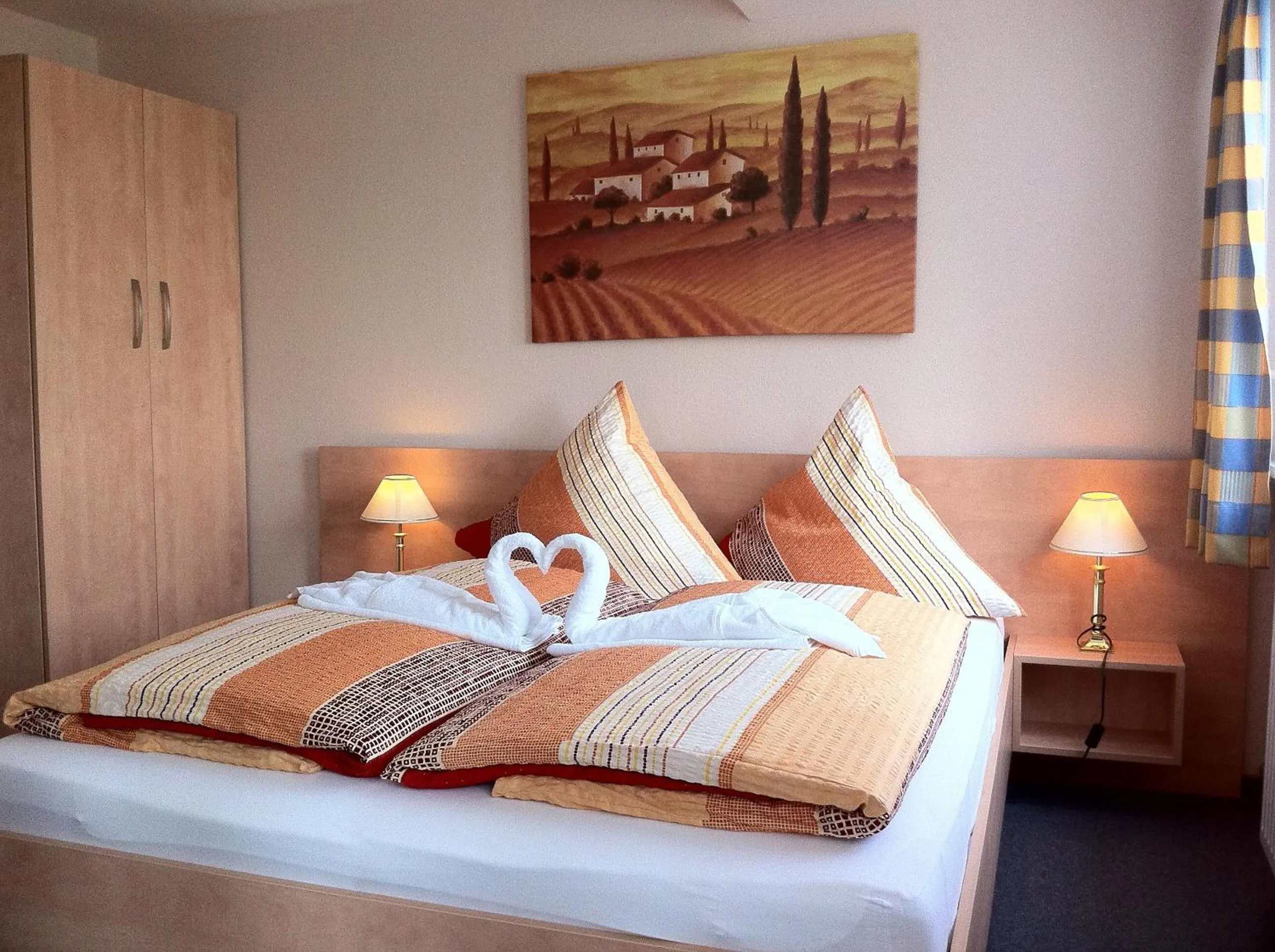 Photo of the whole room, Bed in Hotel Norden Norddeich