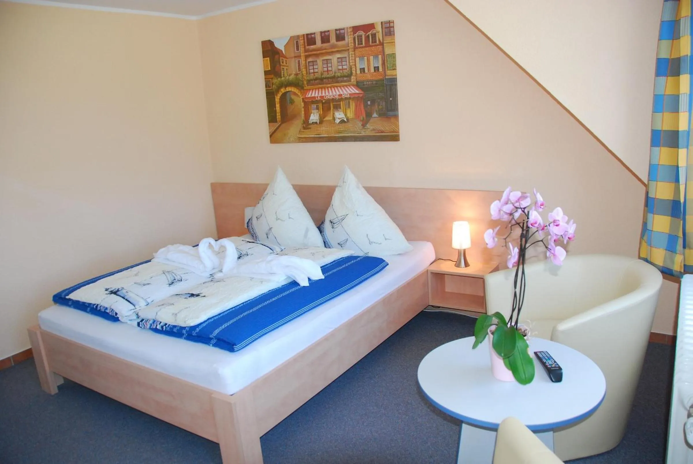 Photo of the whole room, Bed in Hotel Norden Norddeich