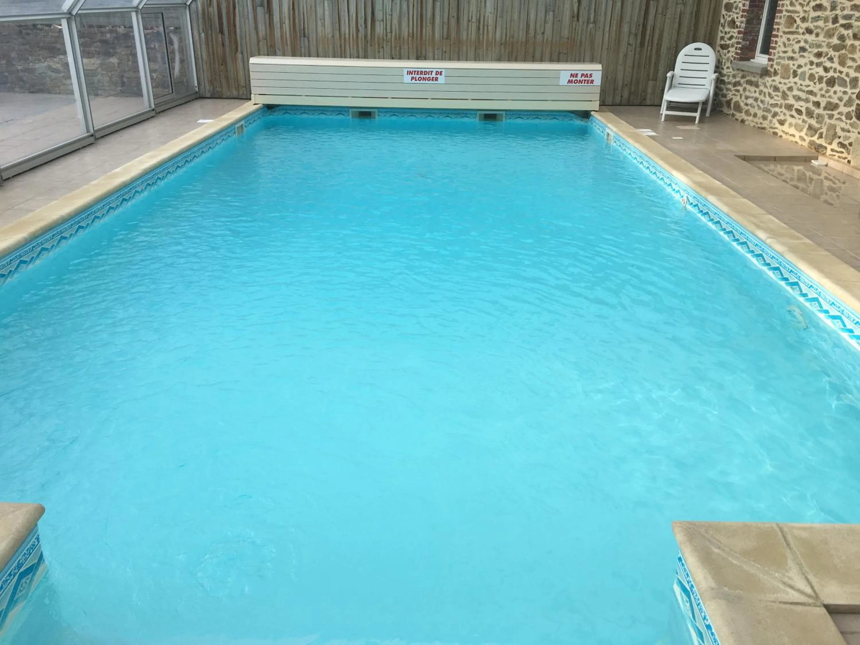 Swimming pool in Les chambres de La Métairie du Dick