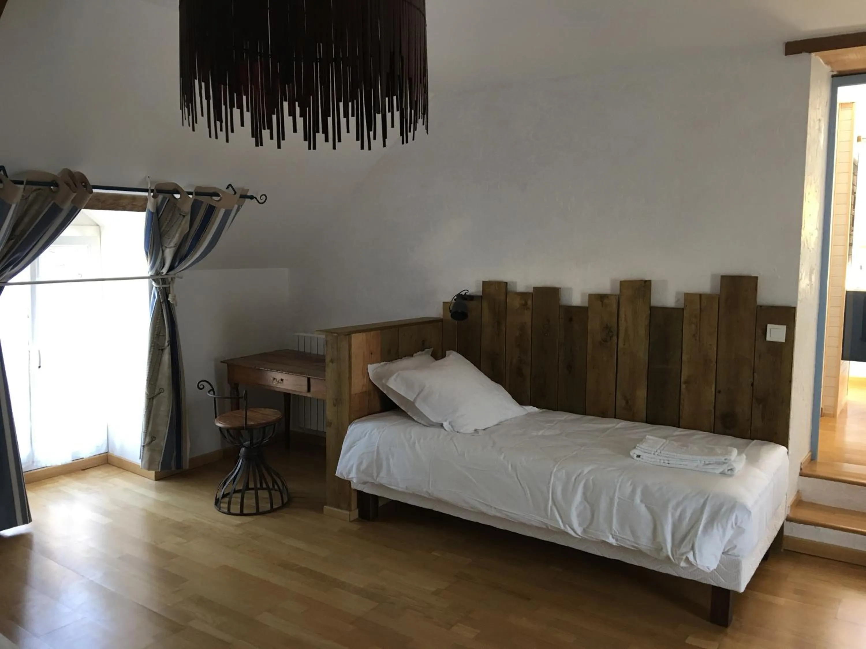 Bed in Les chambres de La Métairie du Dick