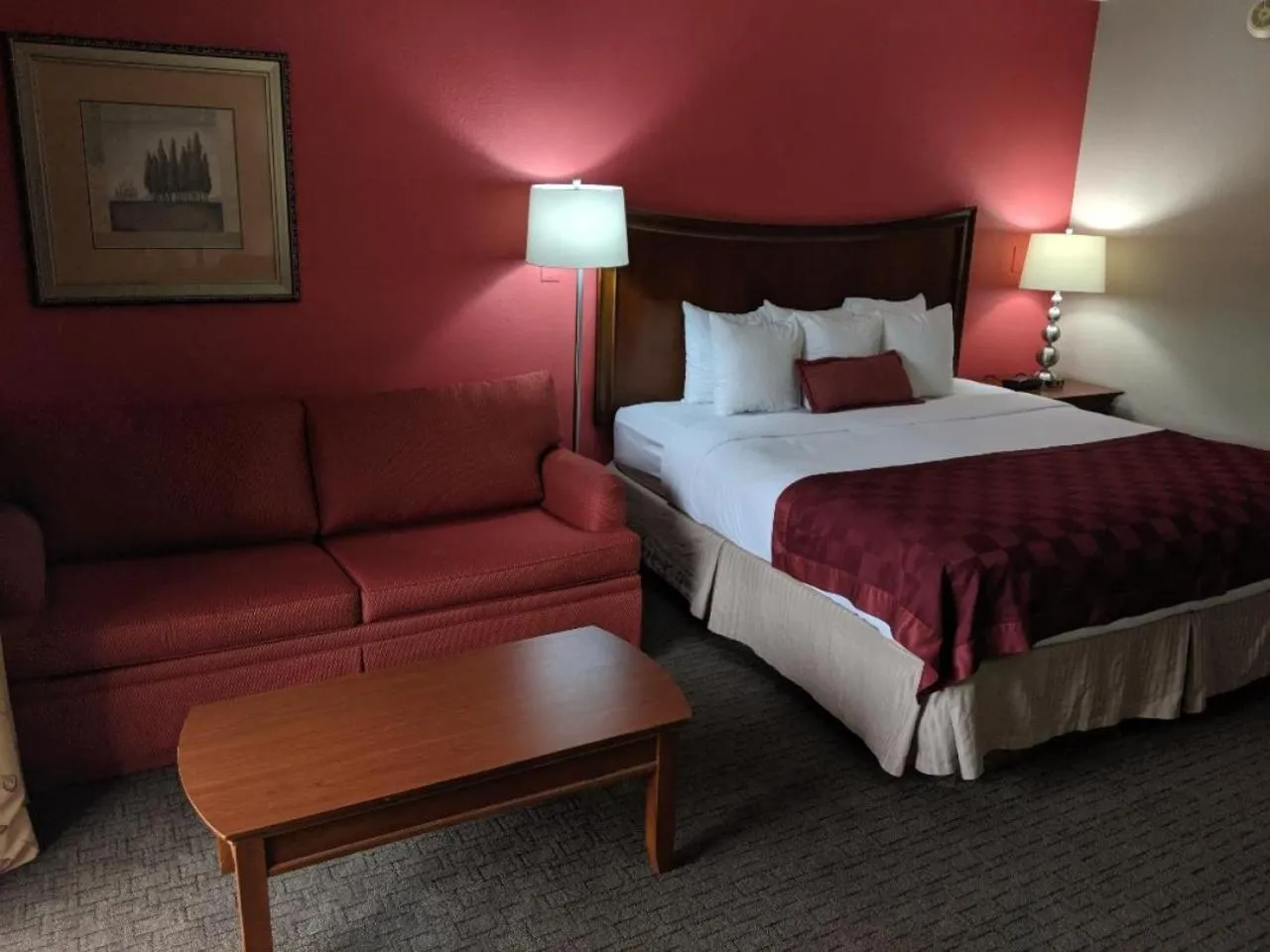Bedroom, Bed in Ramada by Wyndham Raleigh