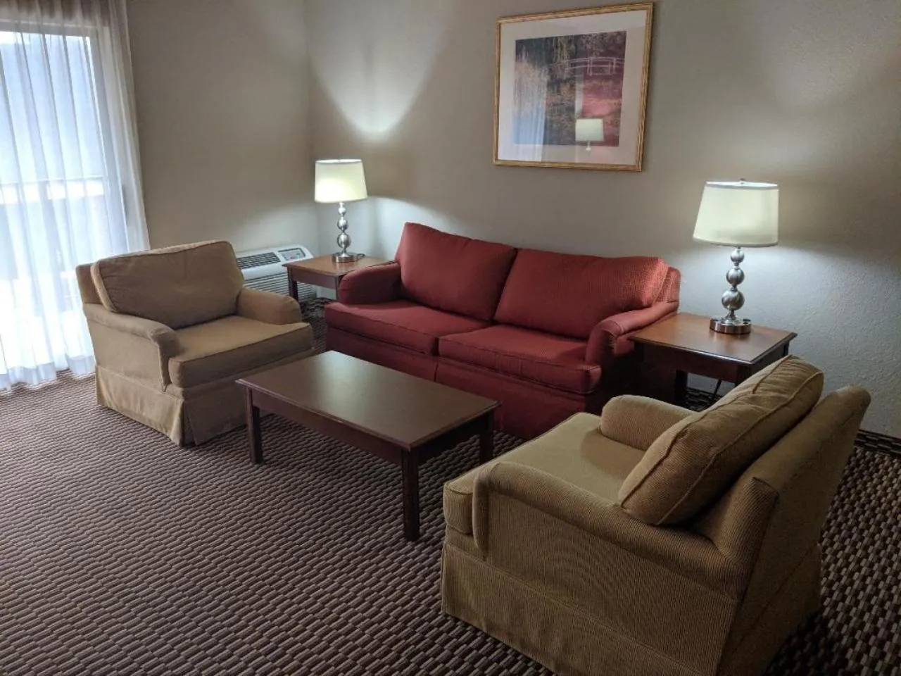 Living room in Ramada by Wyndham Raleigh