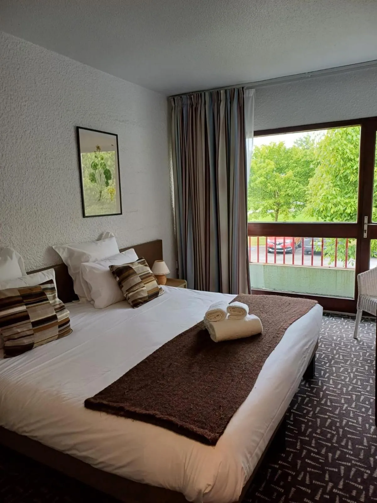 Balcony/Terrace, Bed in Hôtel-Restaurant La Belle Poule -