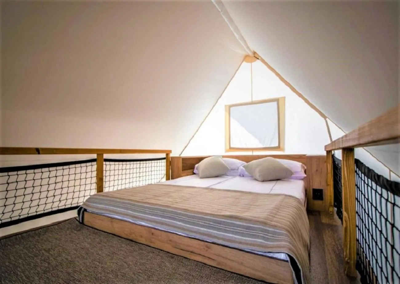 Bed in Villaggio La Pescaccia