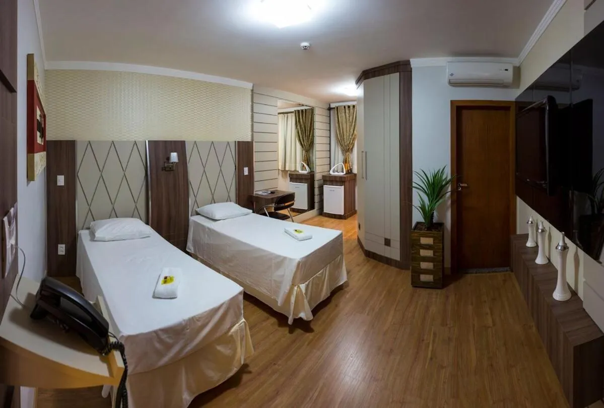 Bed in Paraná Comfort Hotel