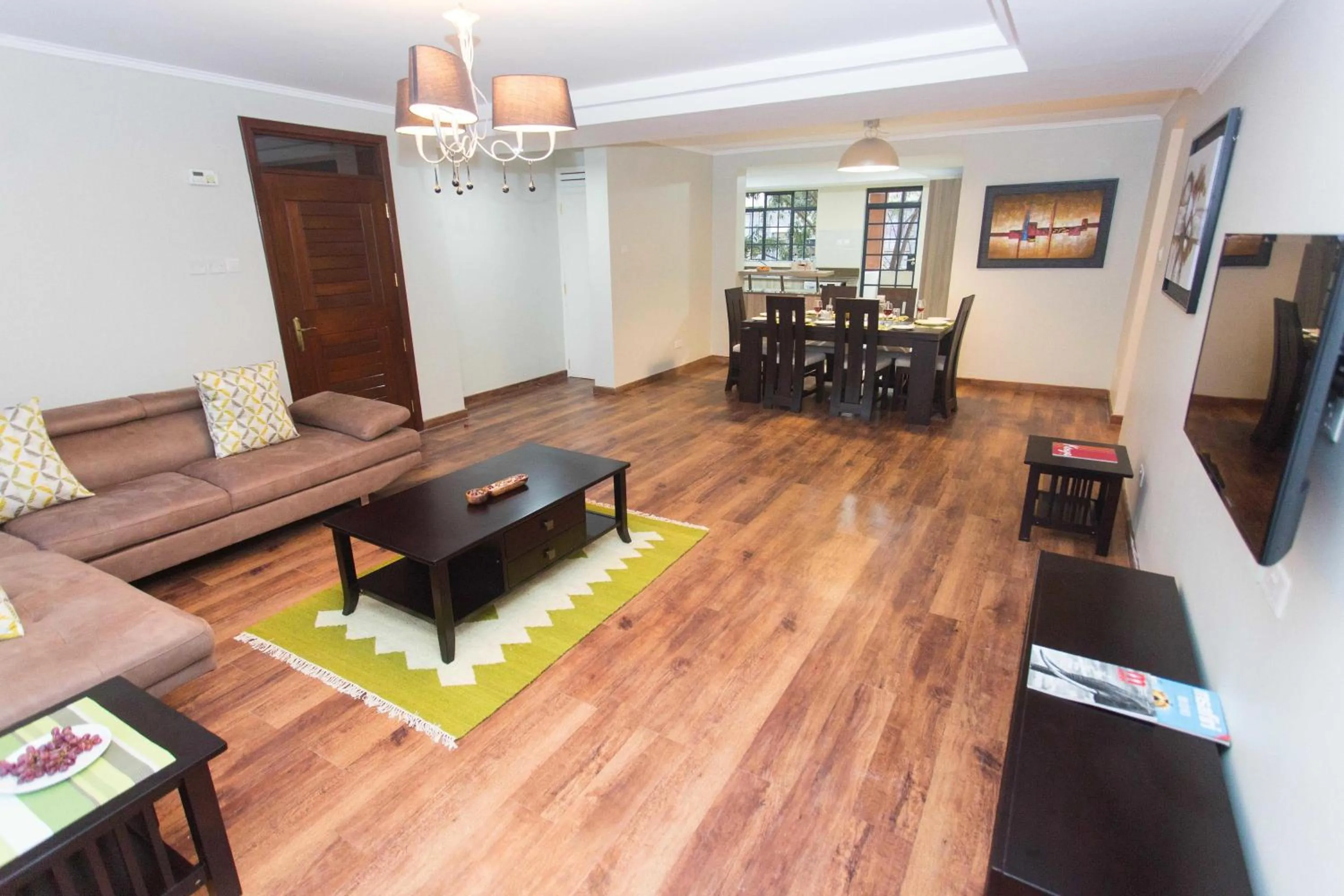 Living room in Cozy Residences by Trianum