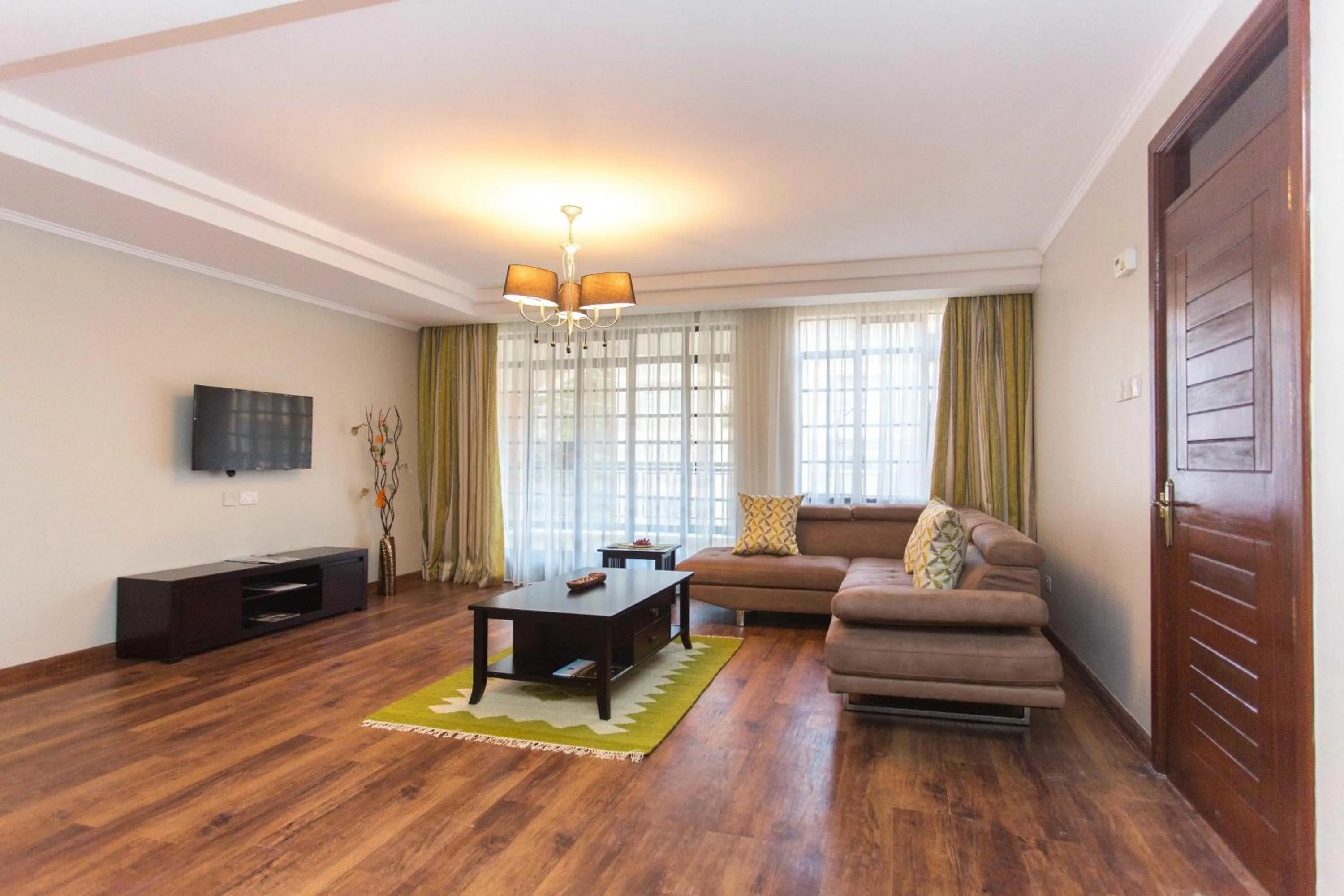 Seating area in Cozy Residences by Trianum