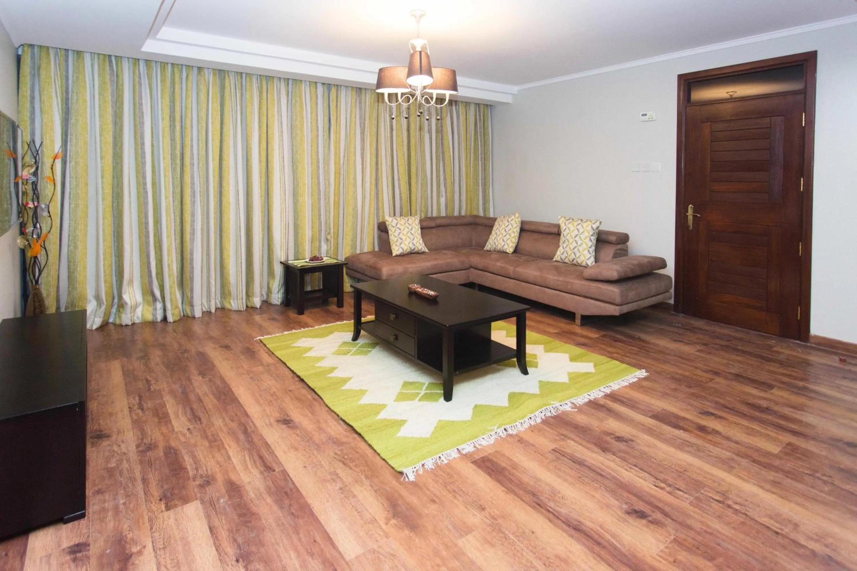 Seating area in Cozy Residences by Trianum