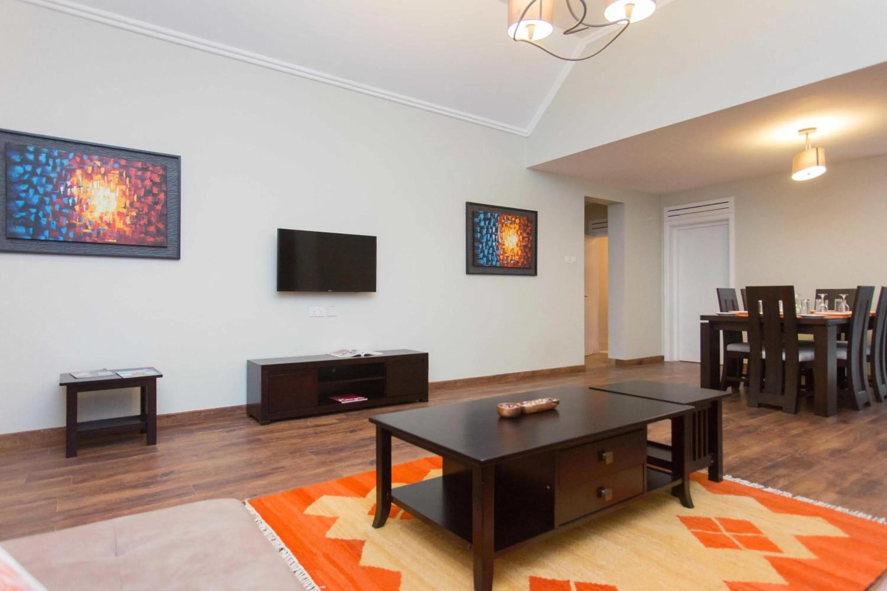 Living room in Cozy Residences by Trianum