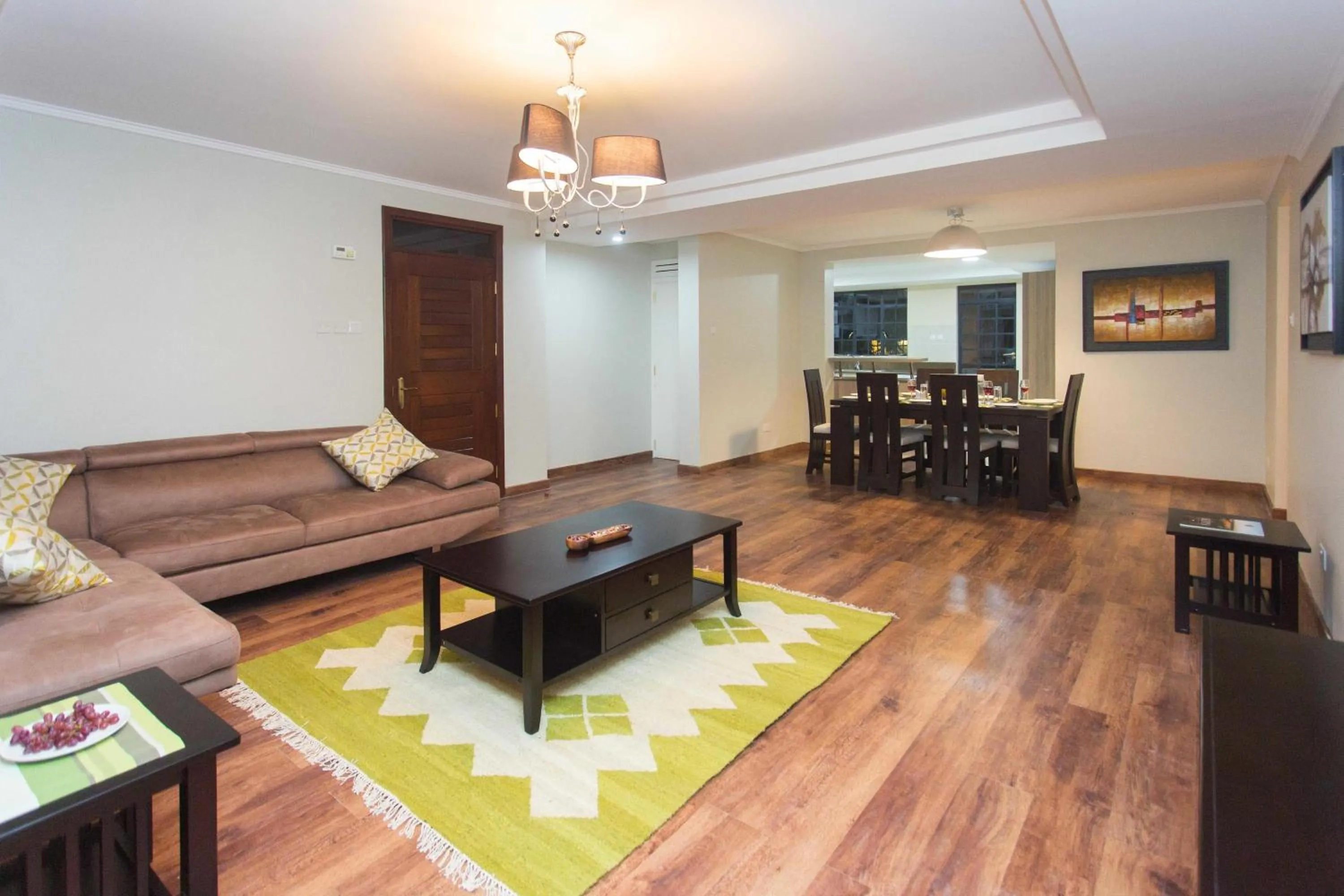 Living room in Cozy Residences by Trianum