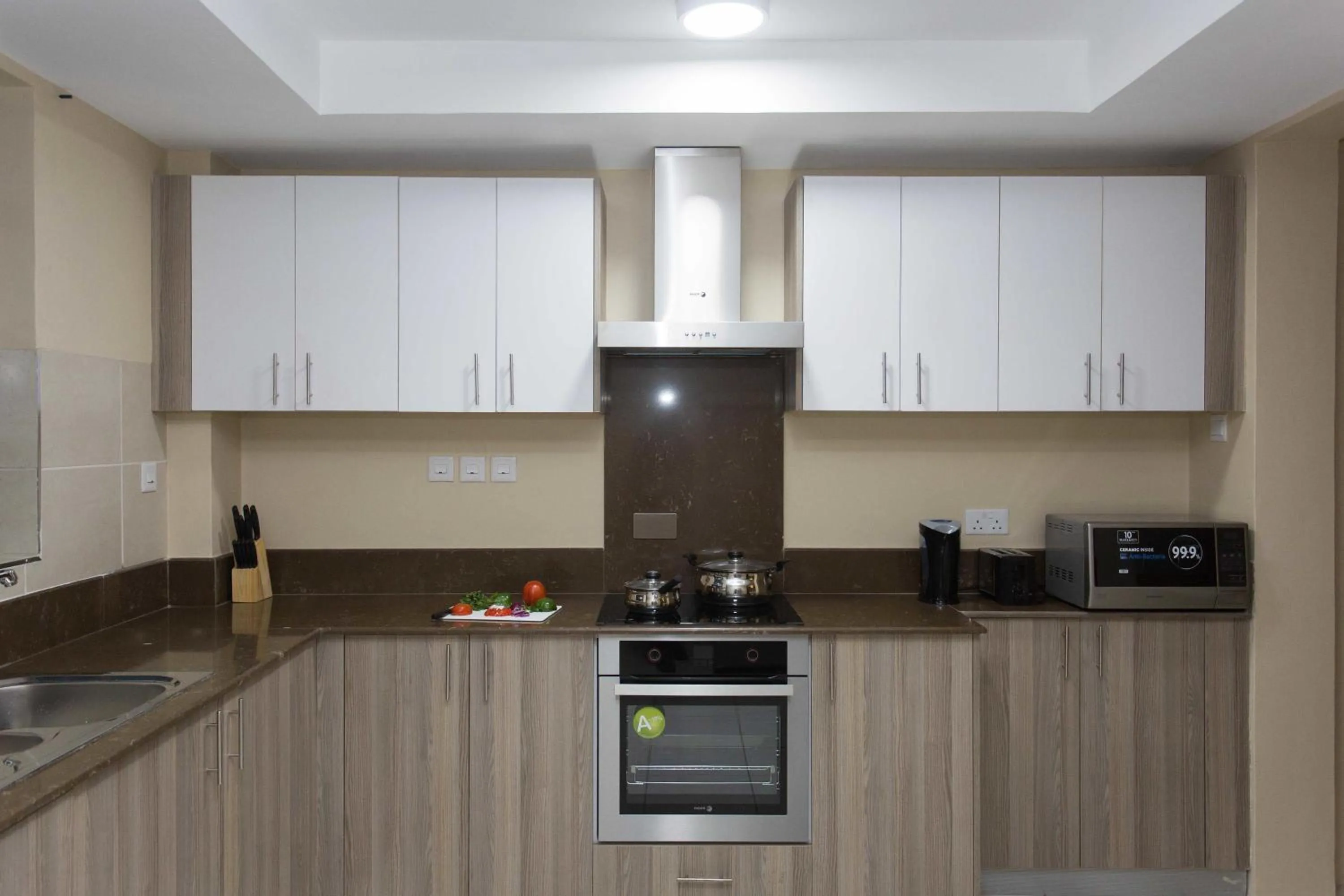 Kitchen or kitchenette in Cozy Residences by Trianum