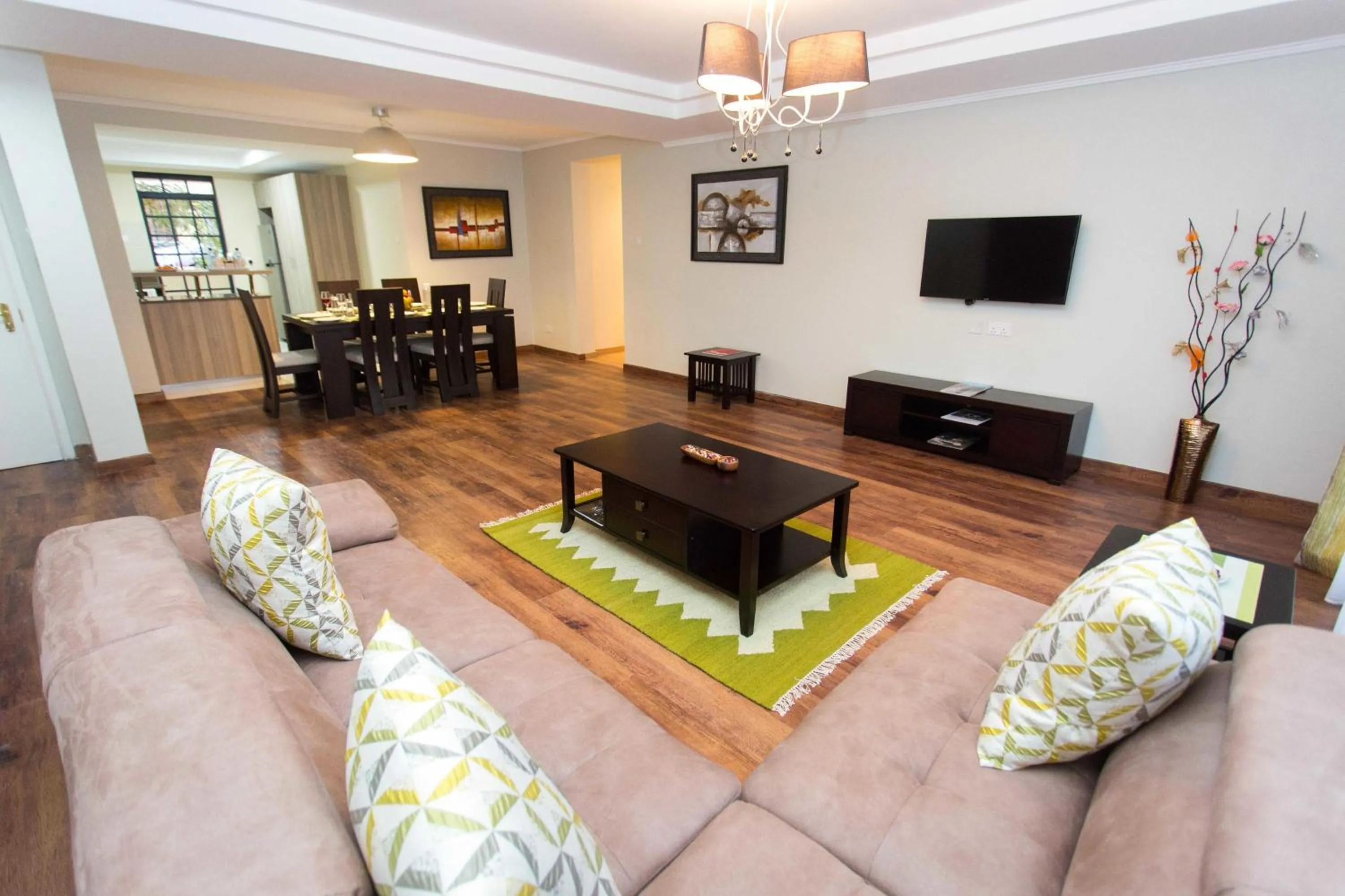 Living room in Cozy Residences by Trianum