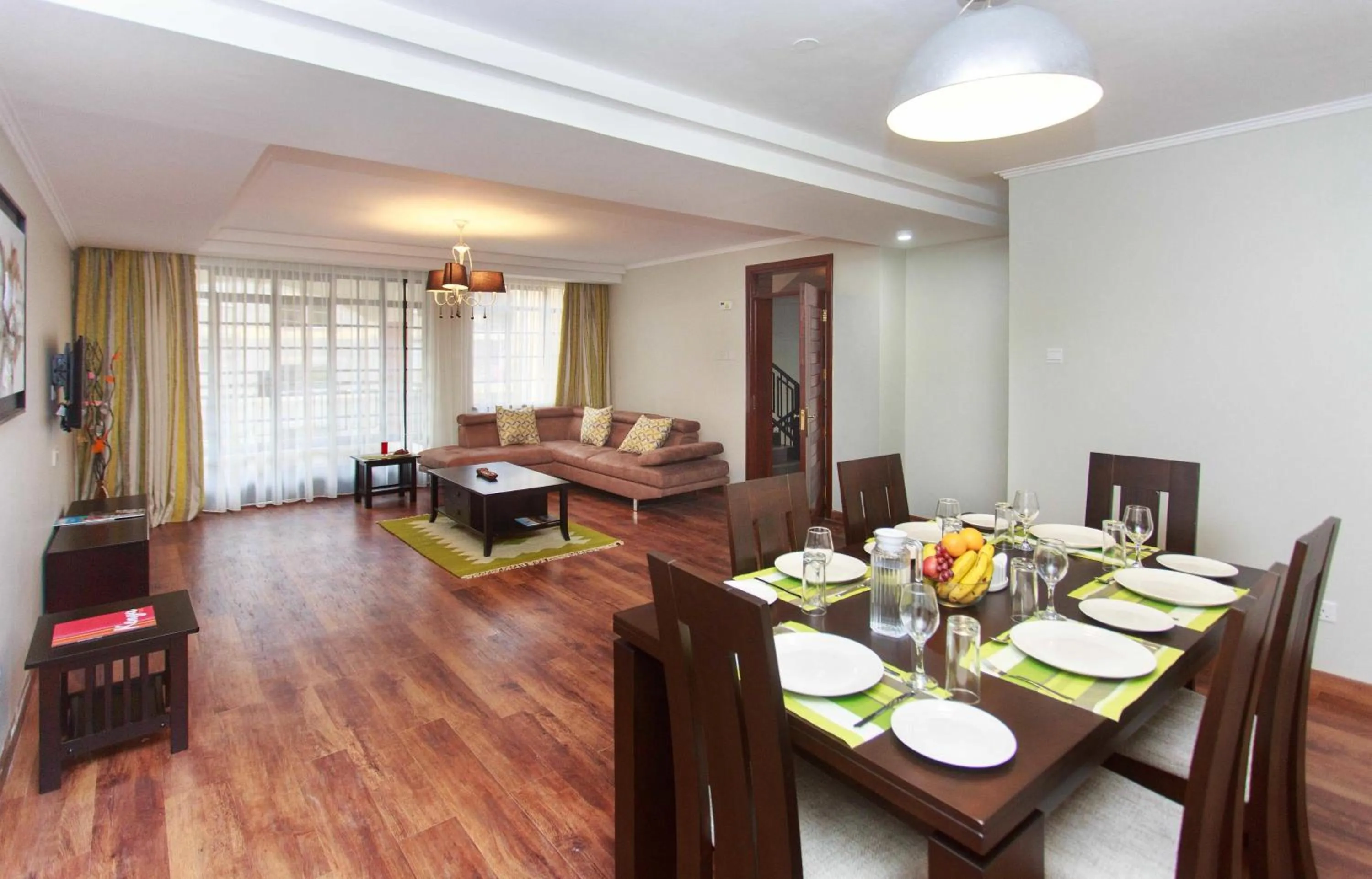 Seating area in Cozy Residences by Trianum