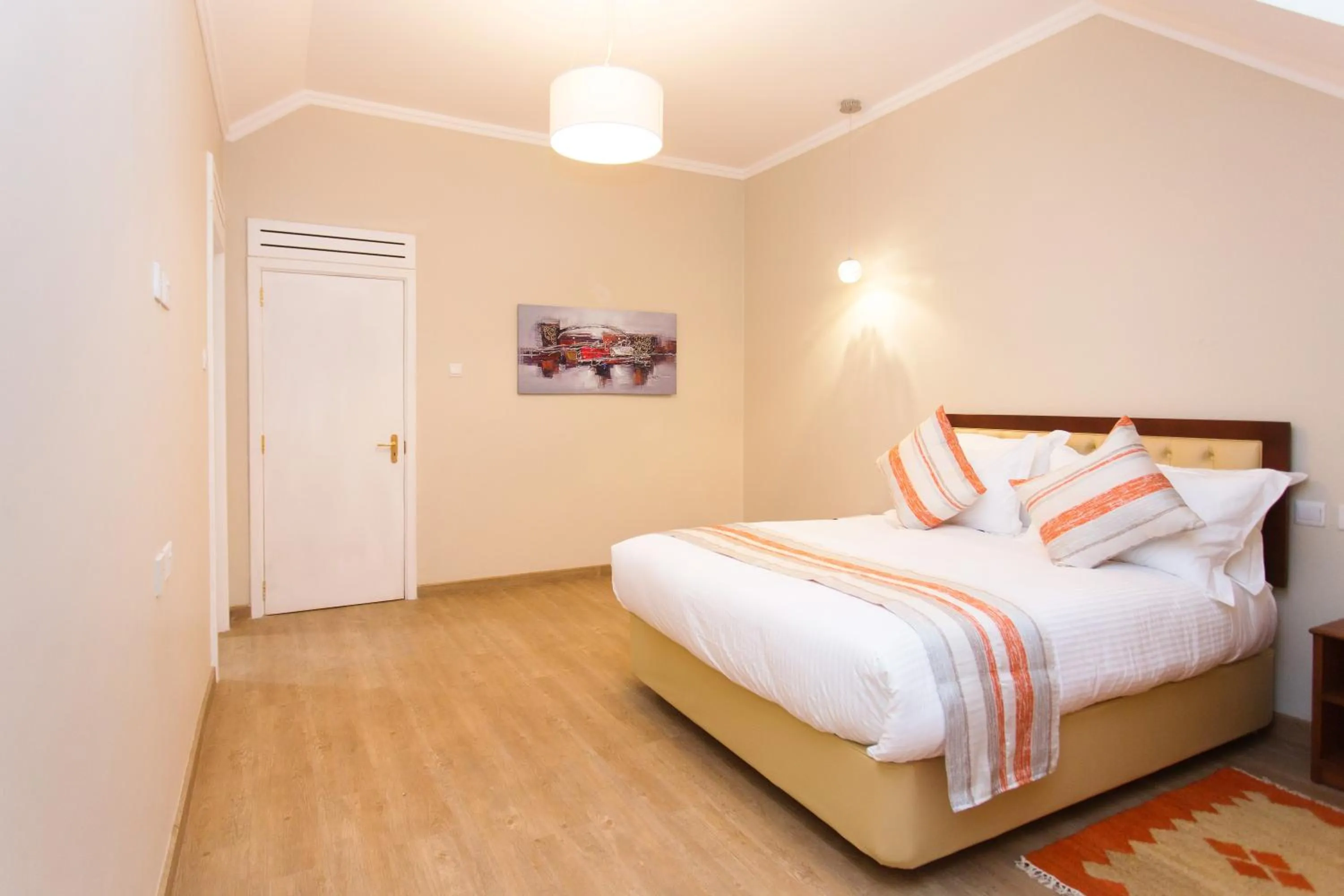 Bed in Cozy Residences by Trianum