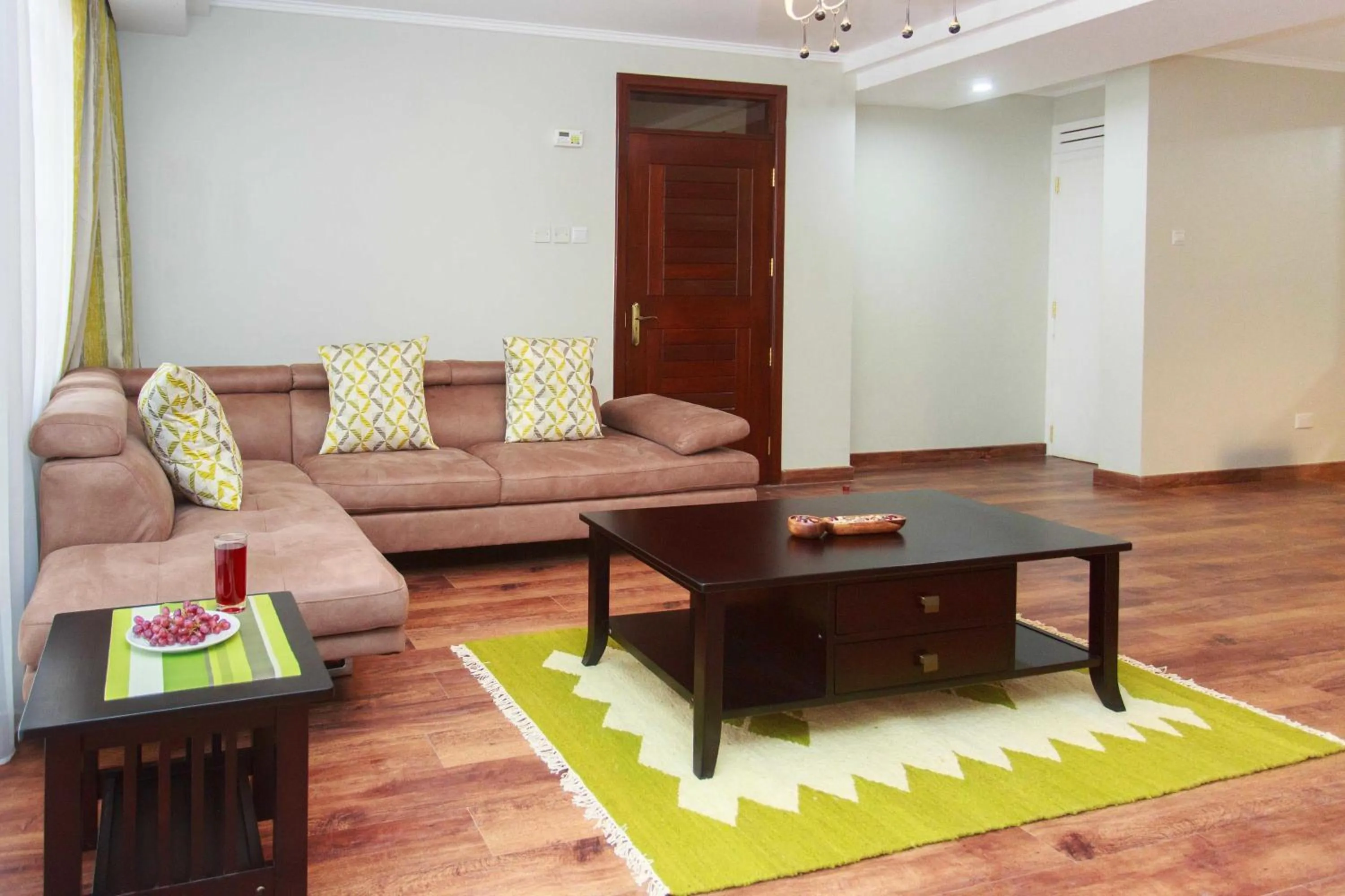 Living room in Cozy Residences by Trianum