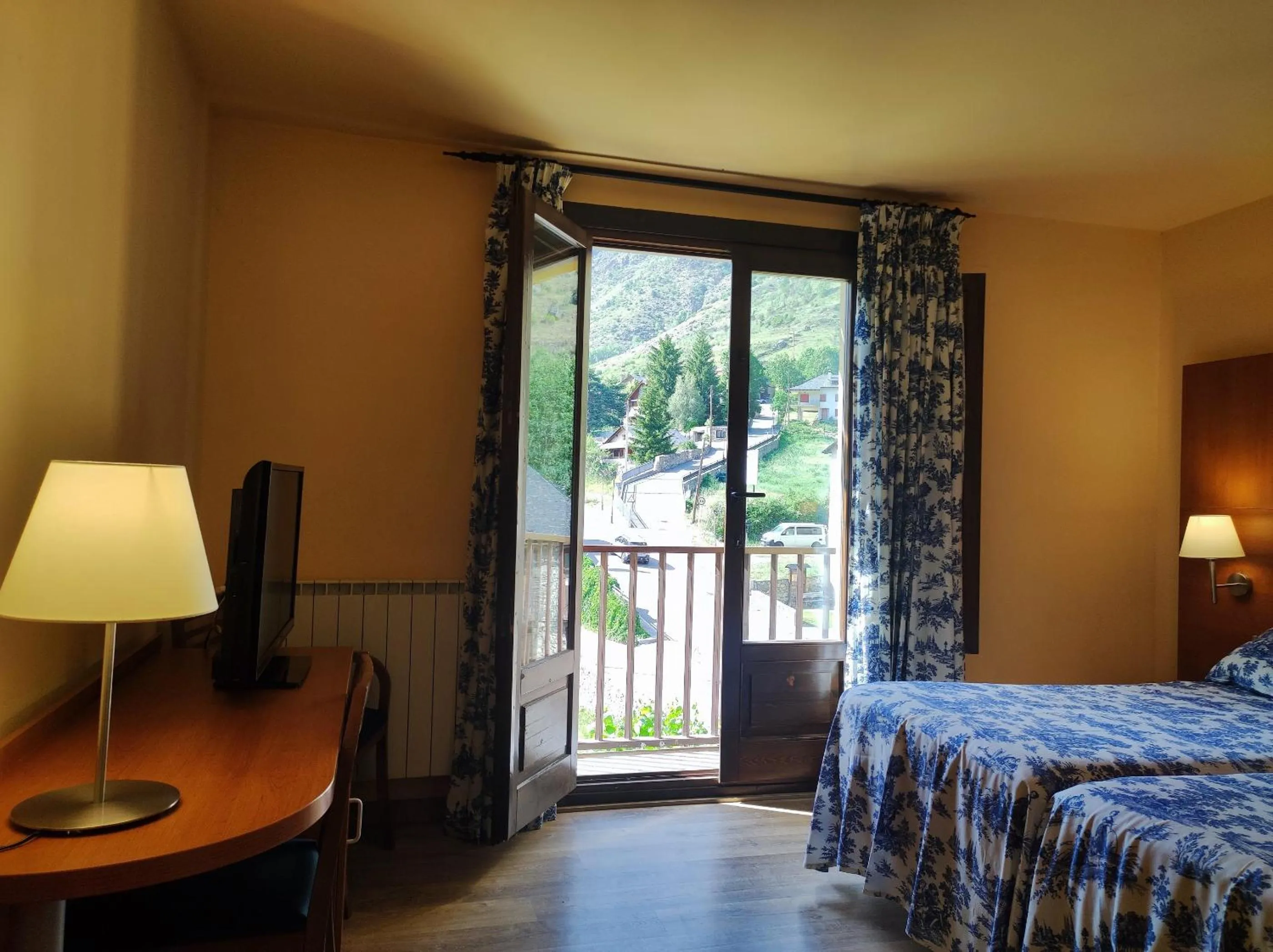View (from property/room), Bed in Hotel Saurat