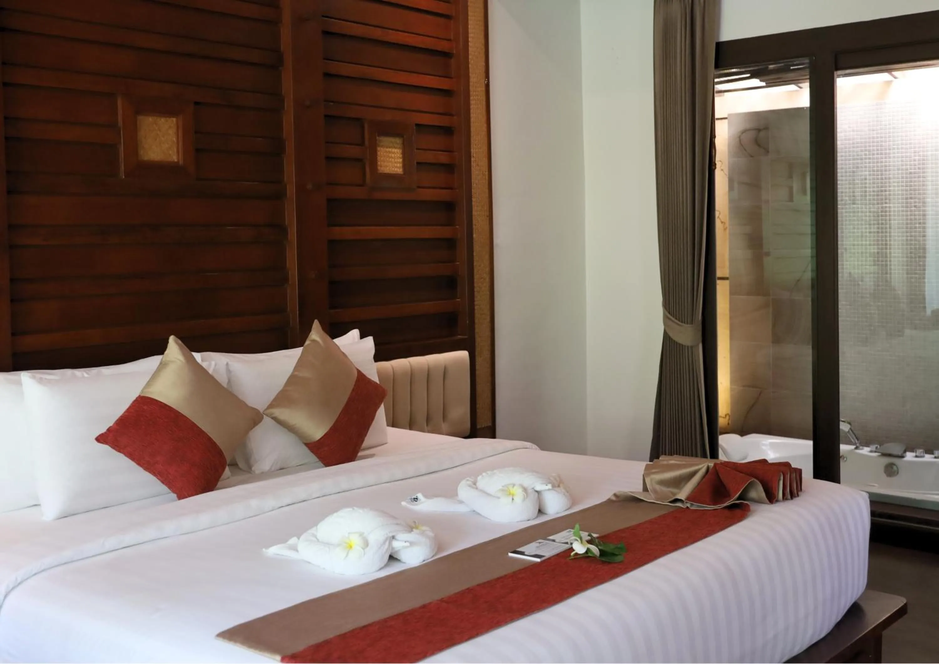 Bed in Railay Village Resort and Spa