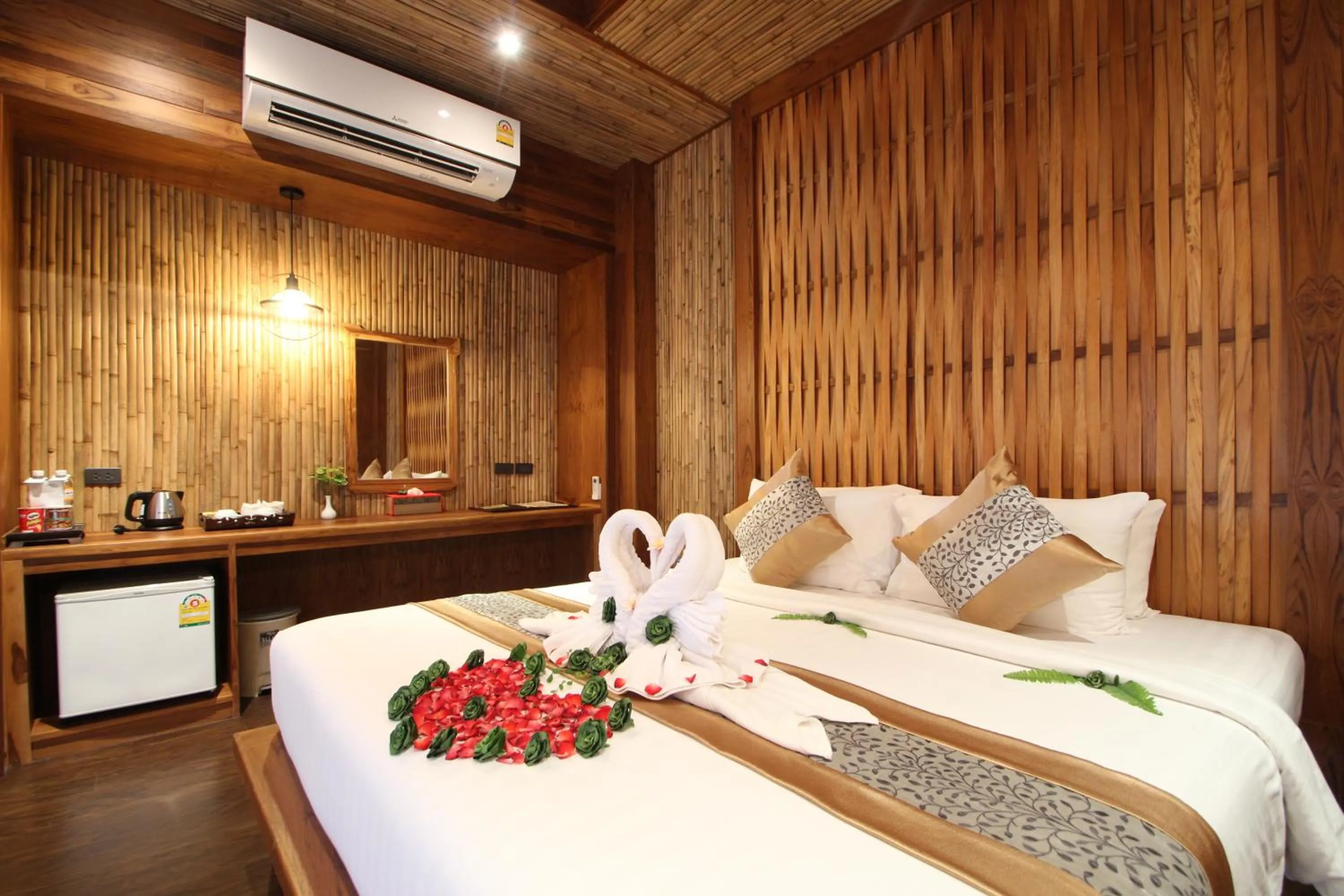 Bed in Railay Village Resort and Spa