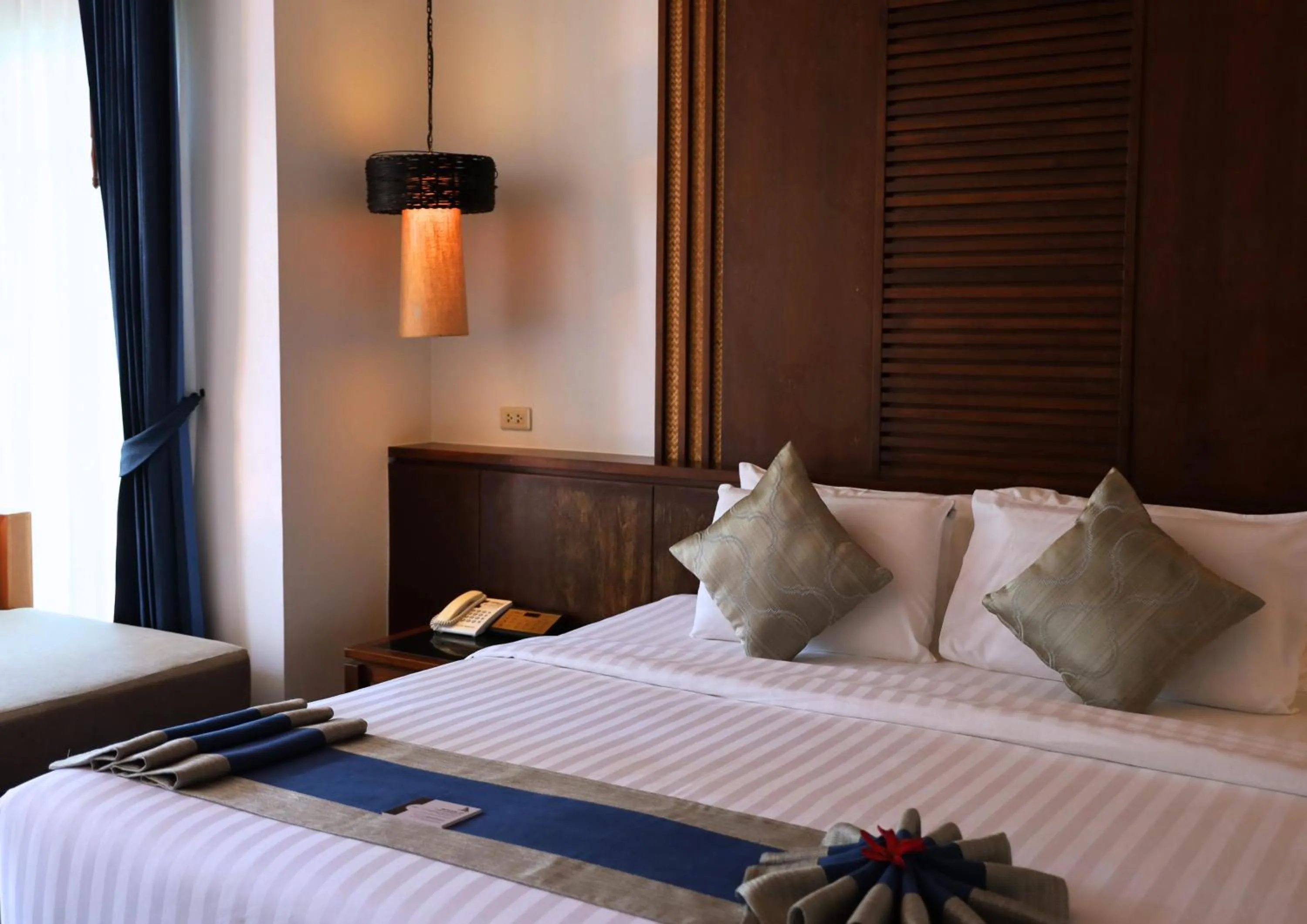 Bed in Railay Village Resort and Spa