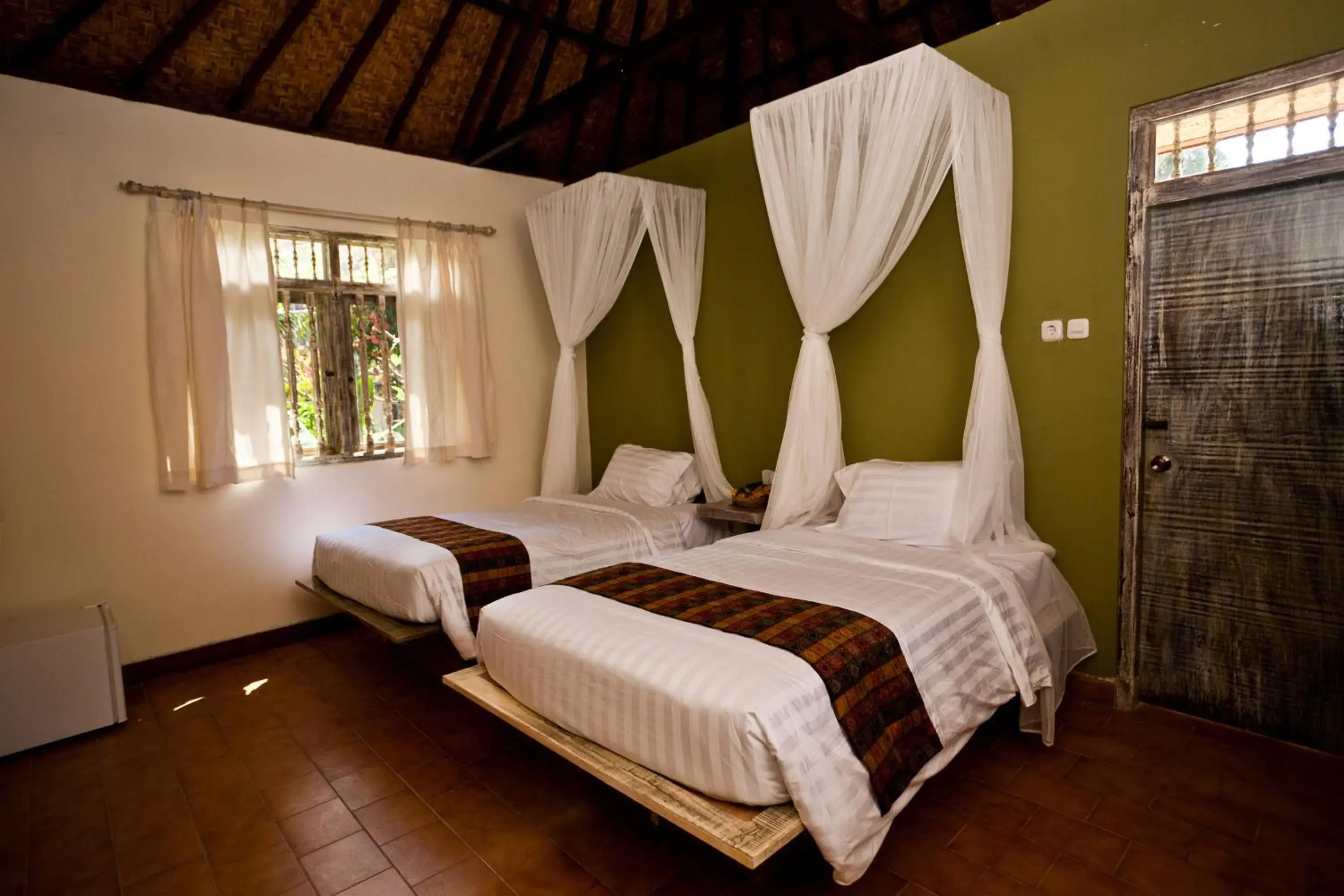 Bedroom, Bed in D'Tunjung Resort & Spa Bedroom, Bed in D'Tunjung Resort & Spa
