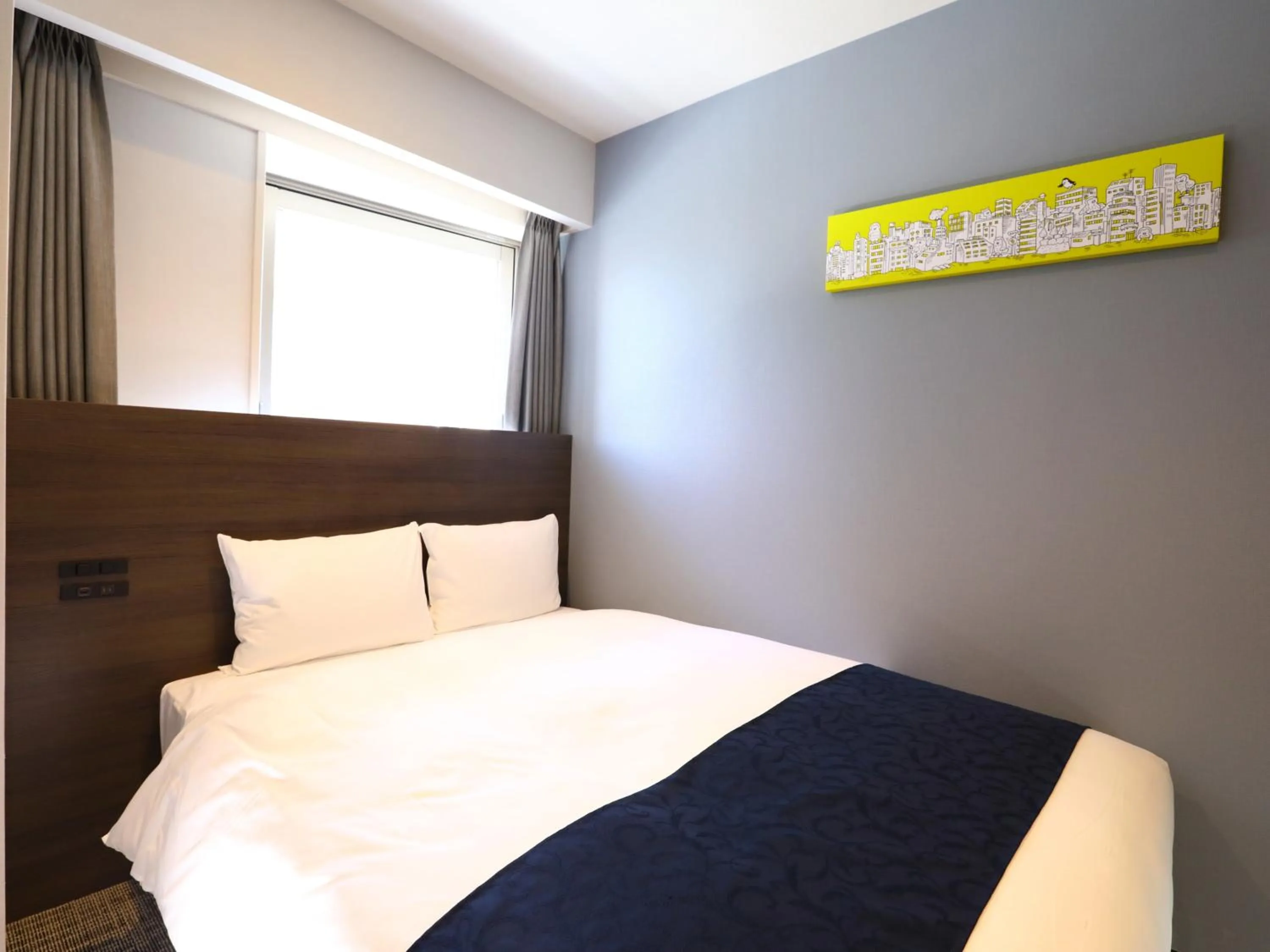 Bed in KOKO HOTEL Ikebukuro East - formerly Hotel Wing International Ikebukuro