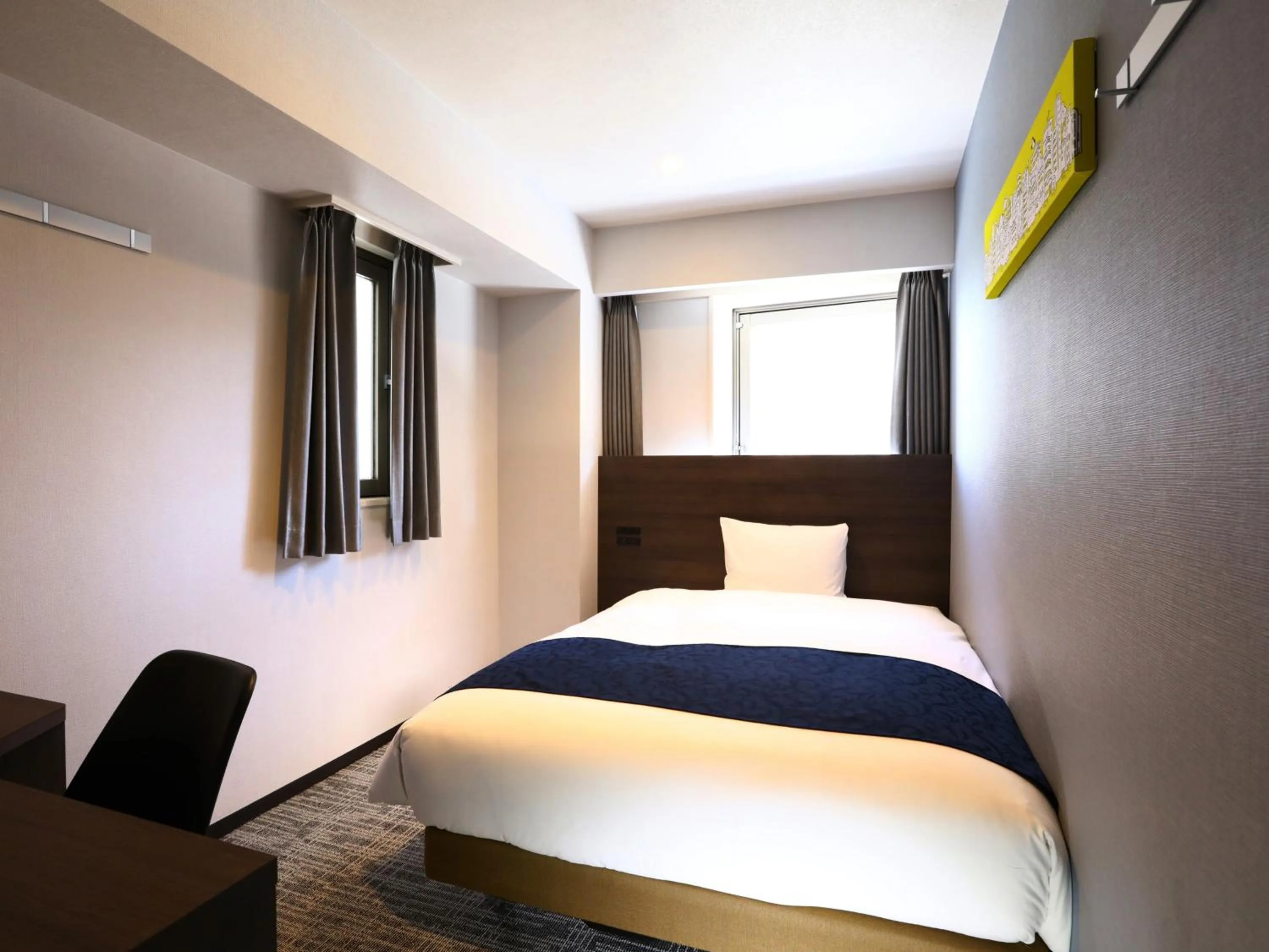 Bed in KOKO HOTEL Ikebukuro East - formerly Hotel Wing International Ikebukuro