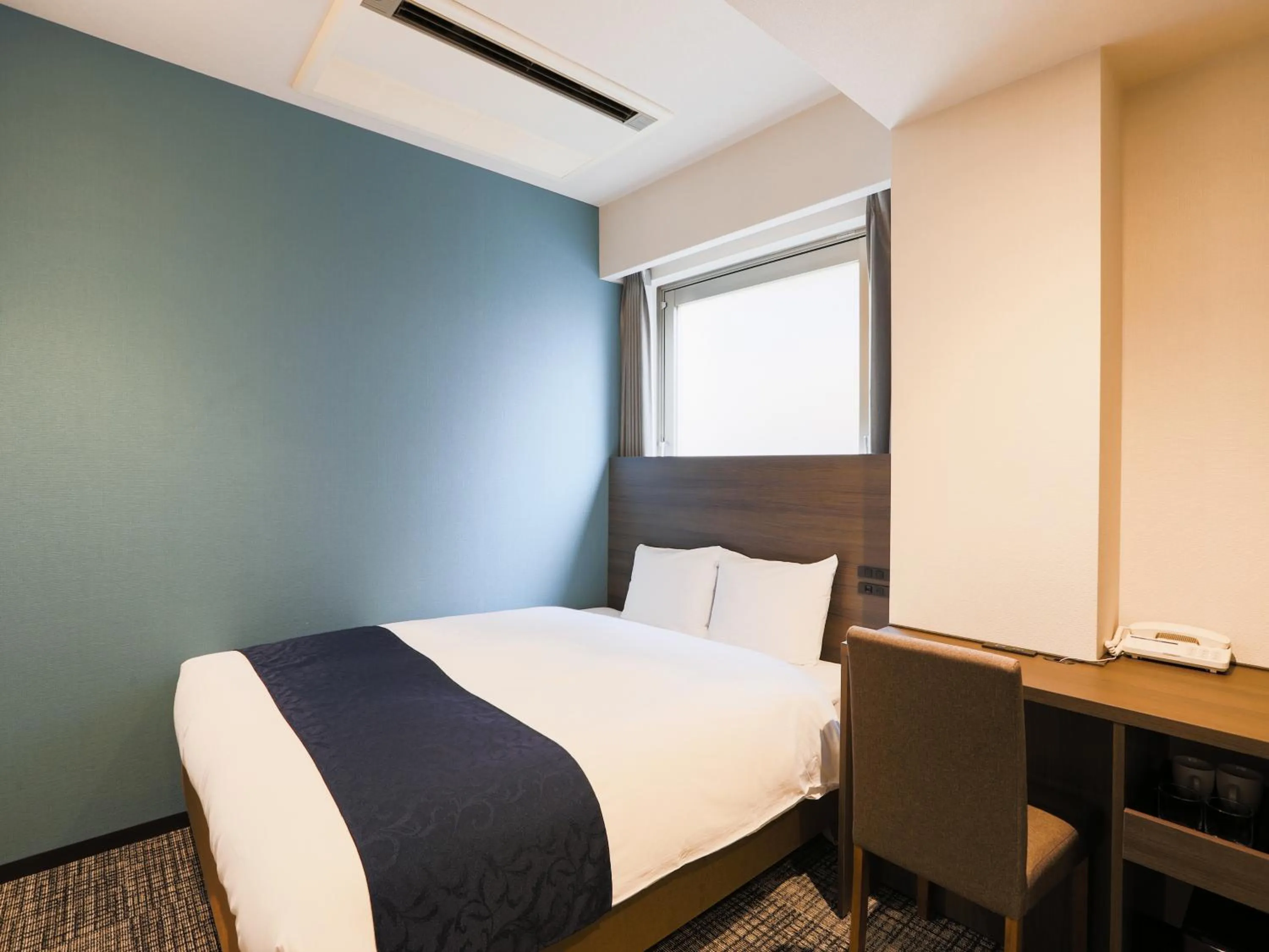 Bed in KOKO HOTEL Ikebukuro East - formerly Hotel Wing International Ikebukuro