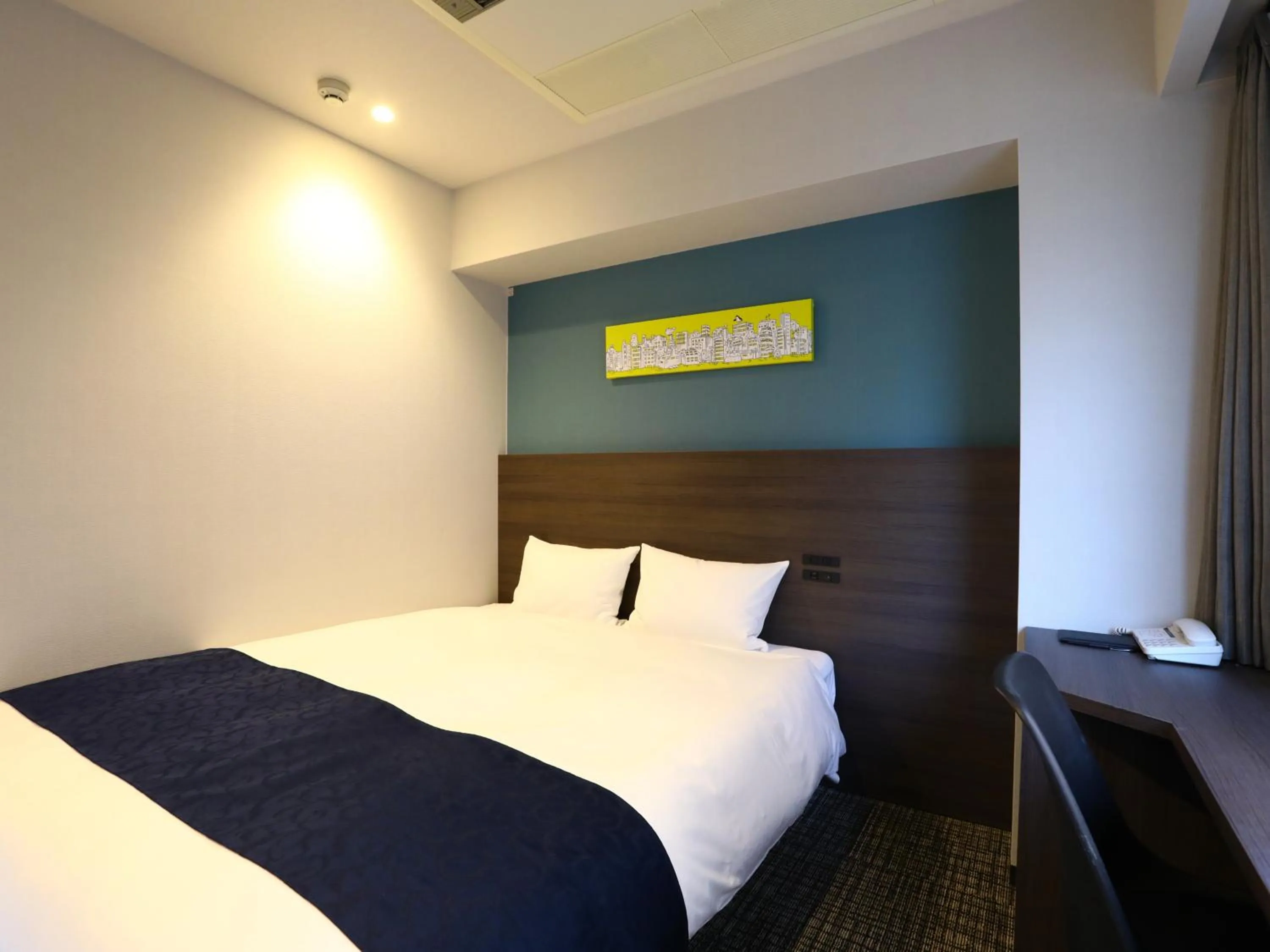 Bed in KOKO HOTEL Ikebukuro East - formerly Hotel Wing International Ikebukuro