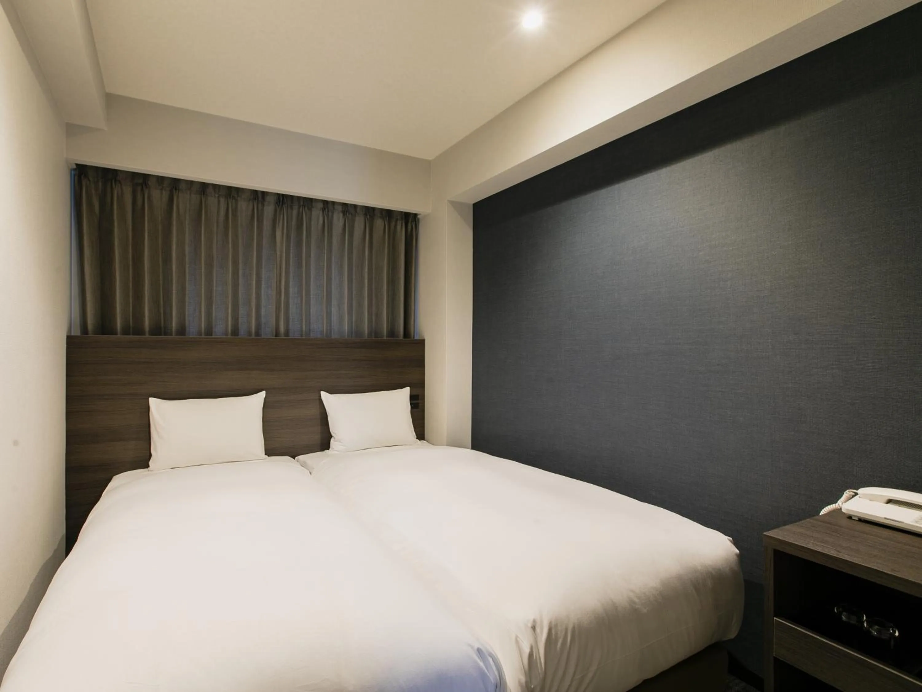 Bed in KOKO HOTEL Ikebukuro East - formerly Hotel Wing International Ikebukuro