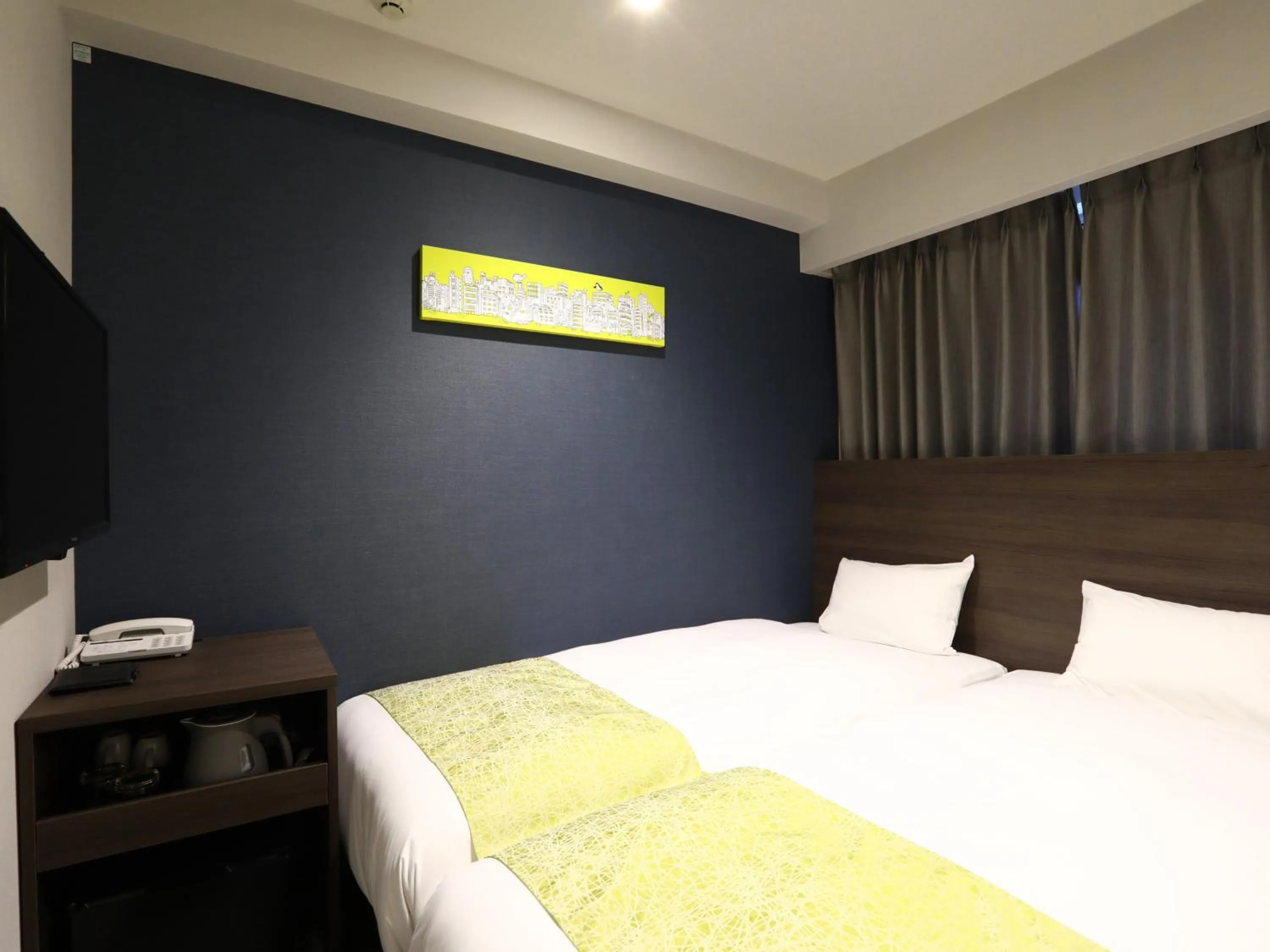 Bed in KOKO HOTEL Ikebukuro East - formerly Hotel Wing International Ikebukuro