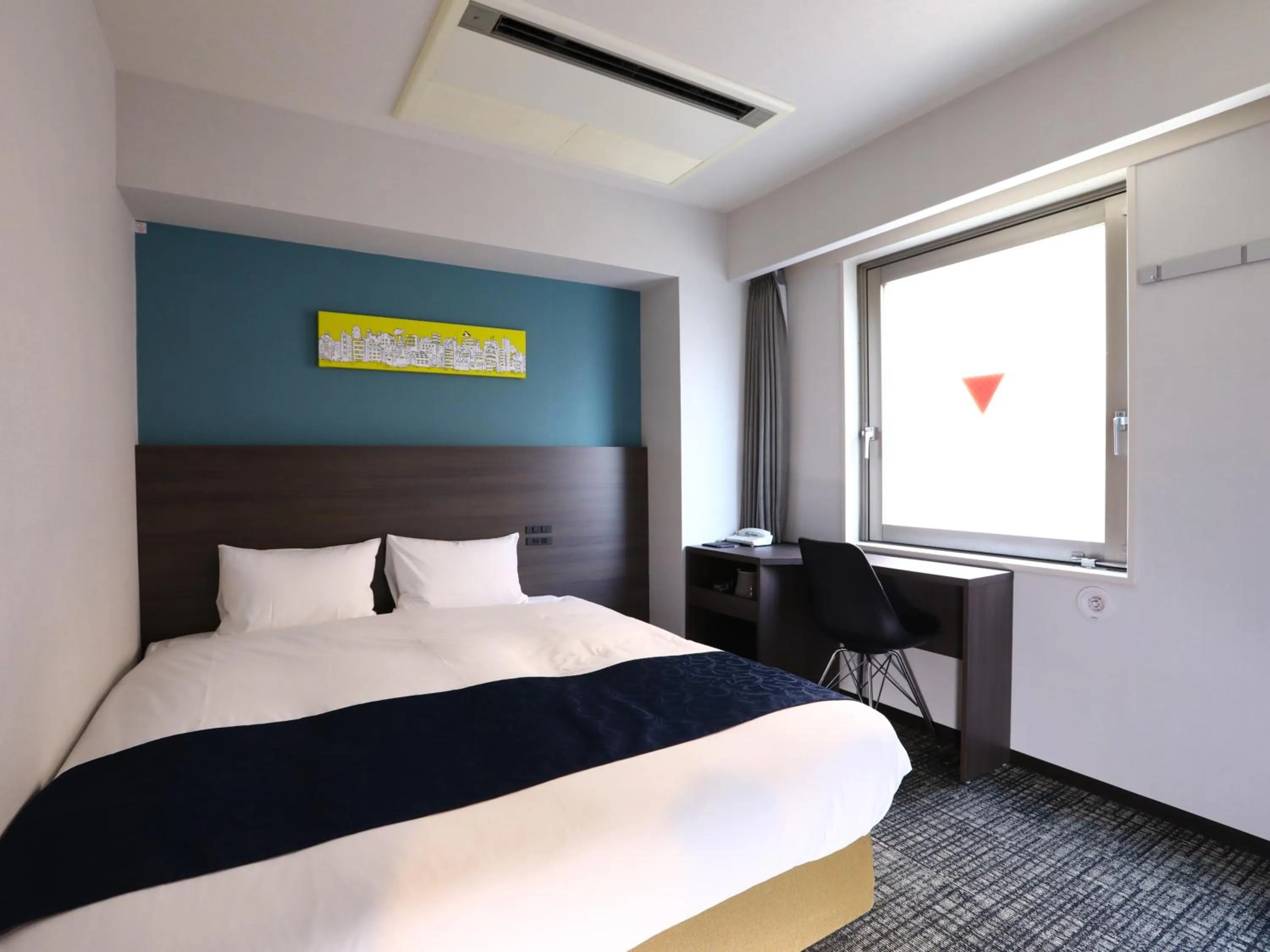 Bed in KOKO HOTEL Ikebukuro East - formerly Hotel Wing International Ikebukuro