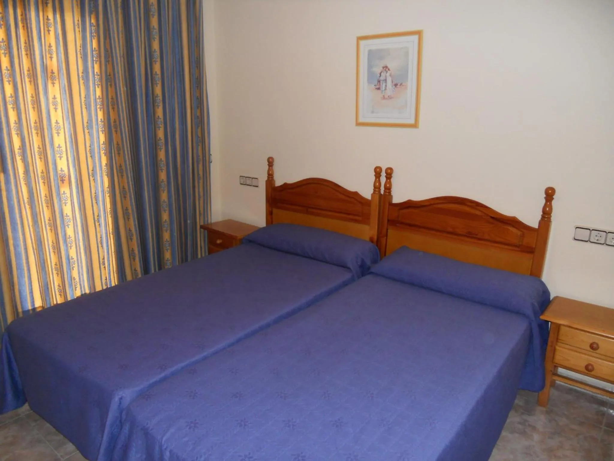 Photo of the whole room in Apartamentos Palas Salou