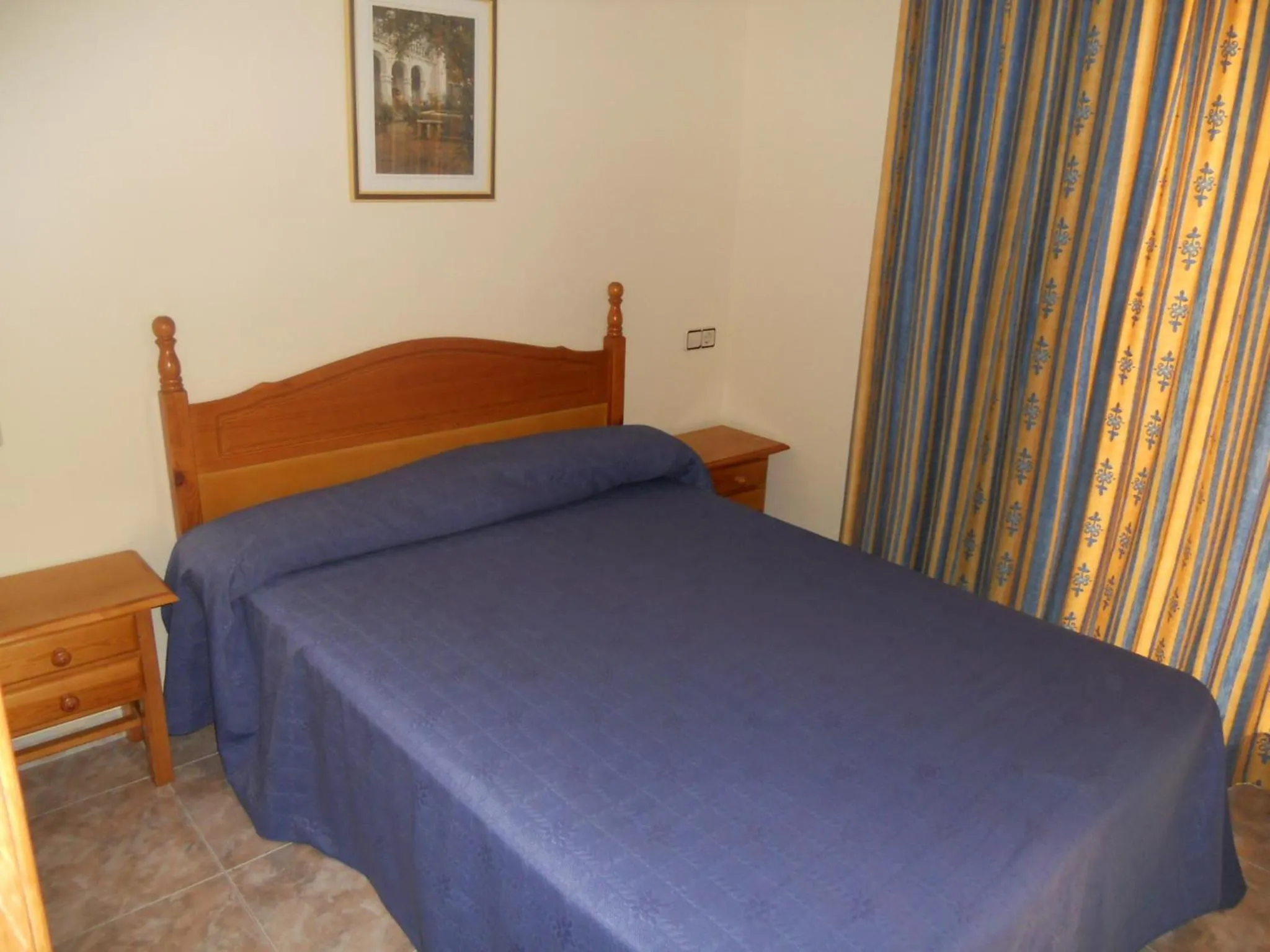Photo of the whole room in Apartamentos Palas Salou