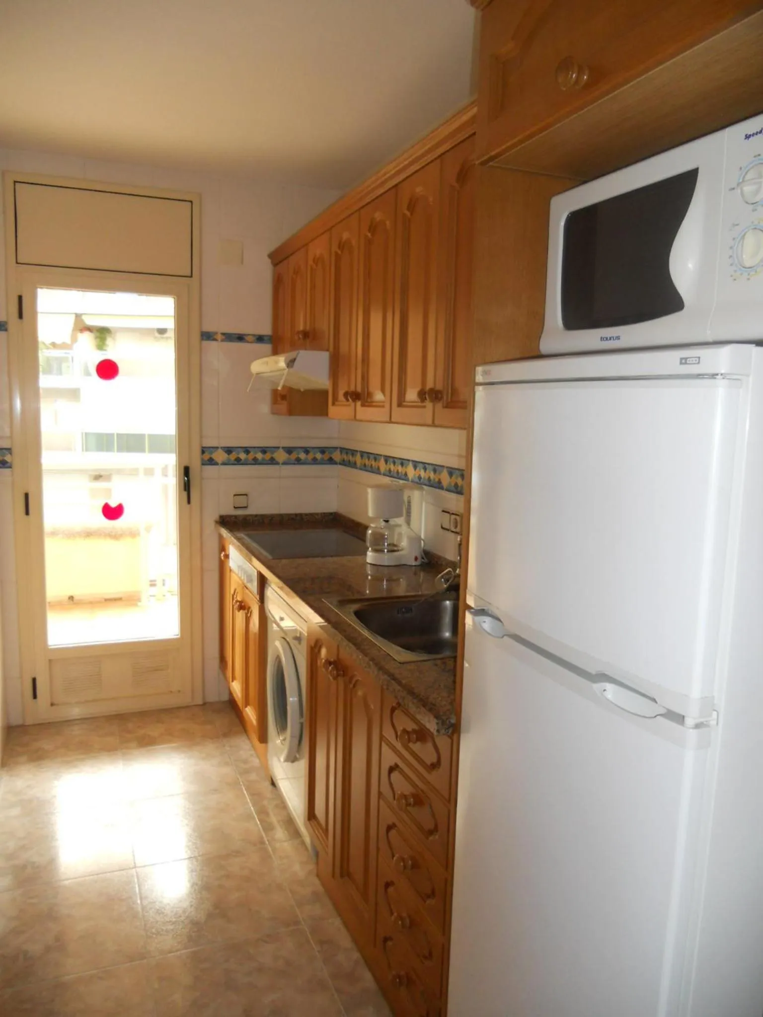 Kitchen or kitchenette in Apartamentos Palas Salou