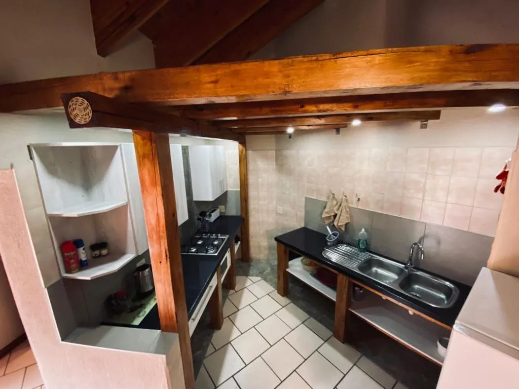 Kitchen or kitchenette in Tatenda Guest House