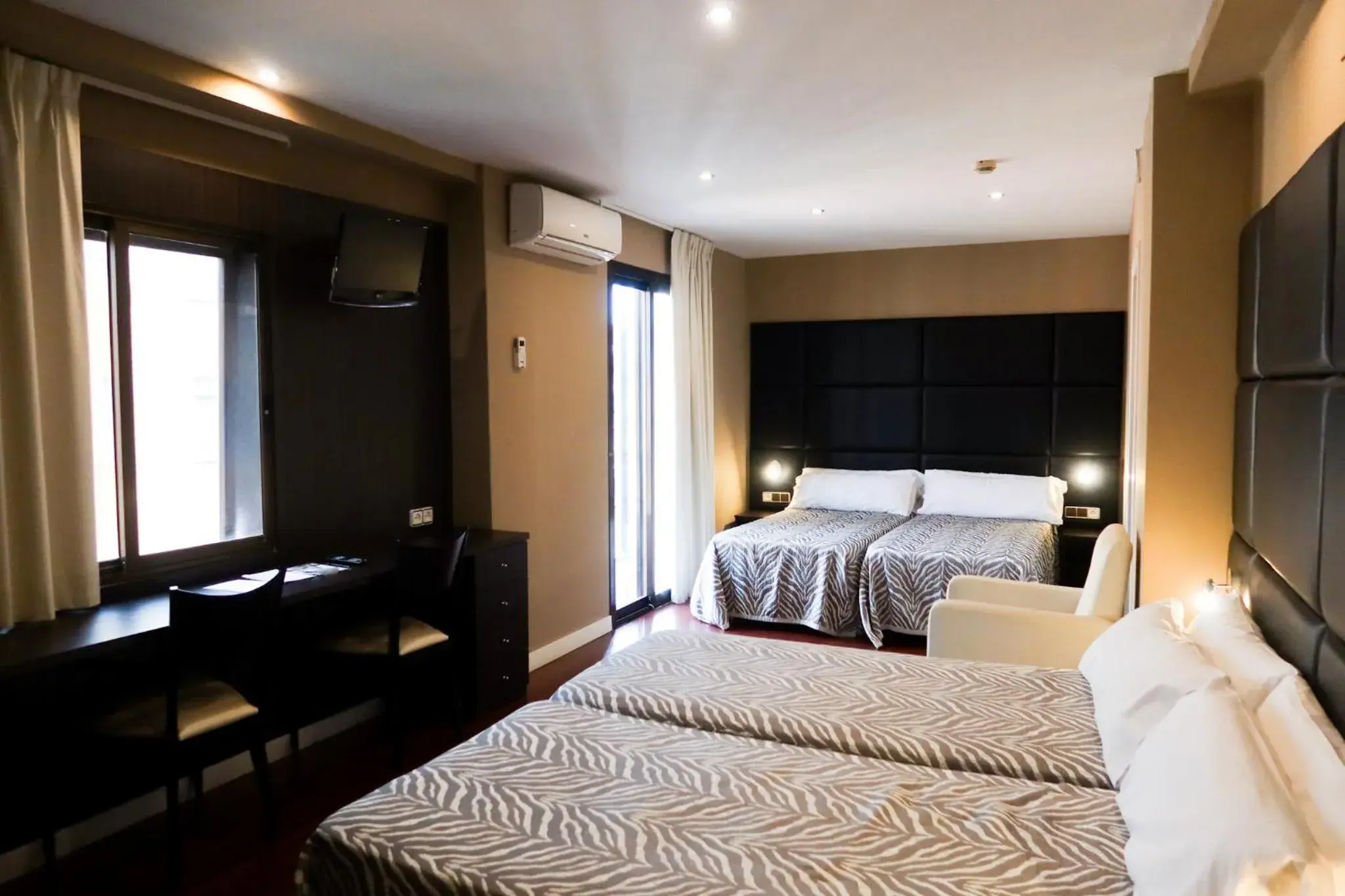 Bed in Hotel Benetusser Bed in Hotel Benetusser