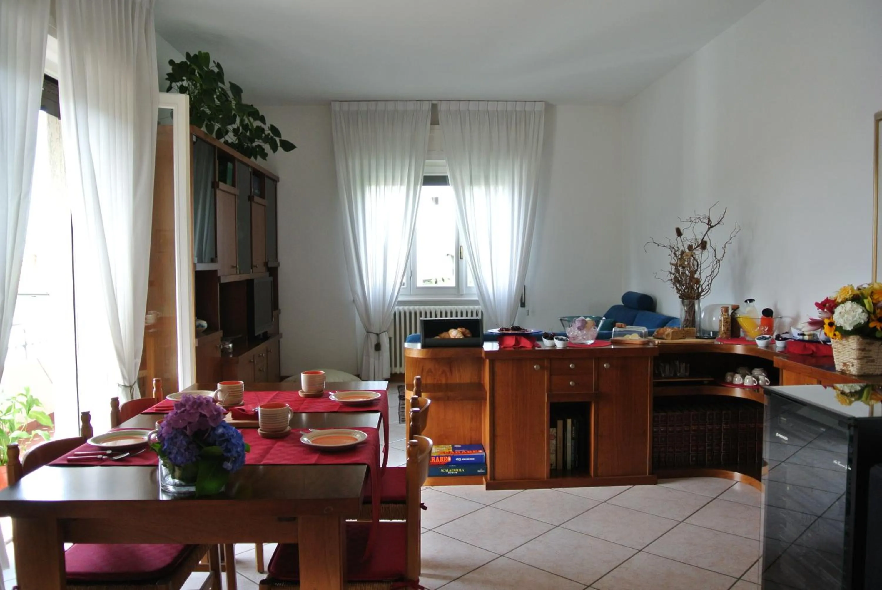 Communal lounge/ TV room in B&B SARI