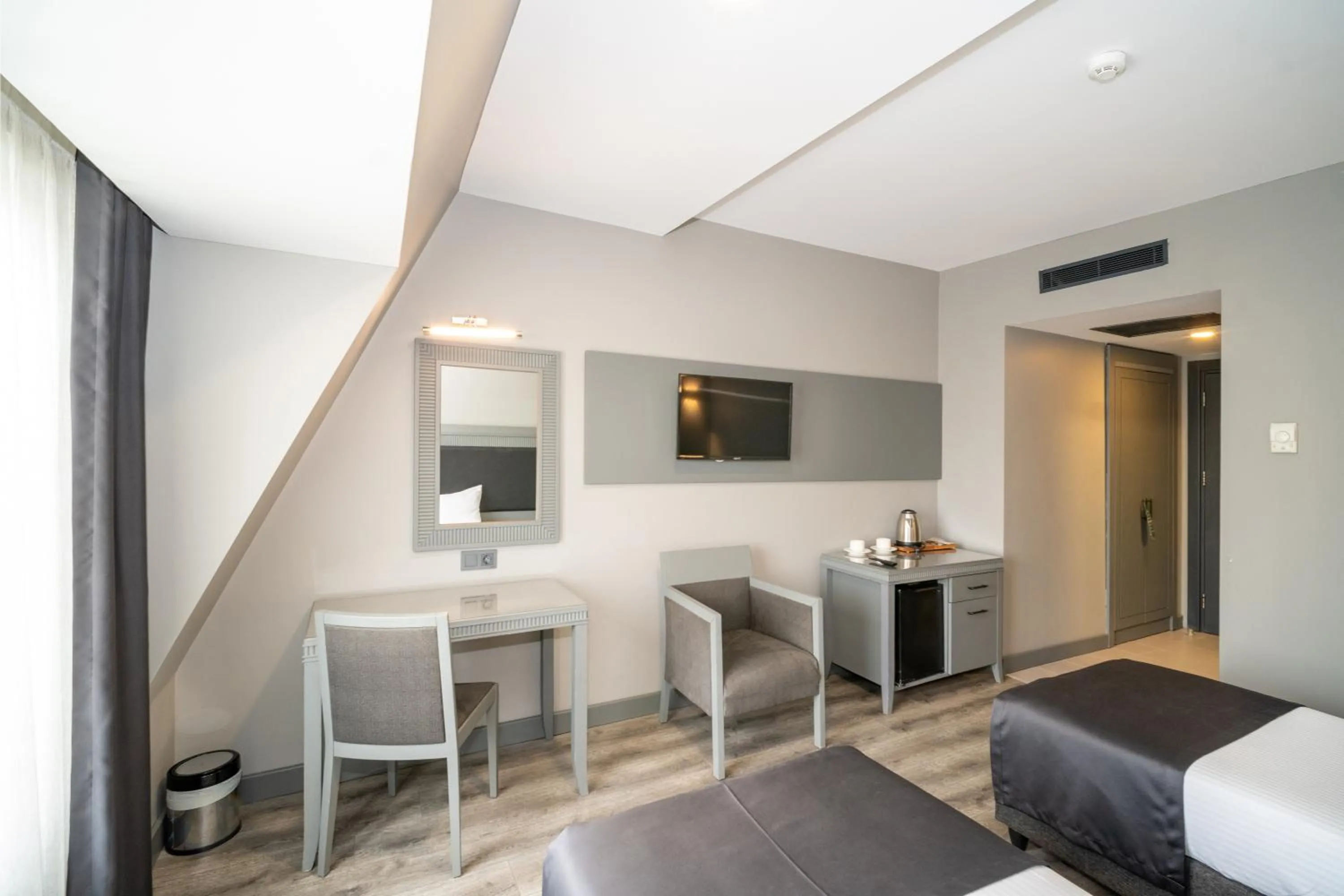 Bed in Grand S Hotel