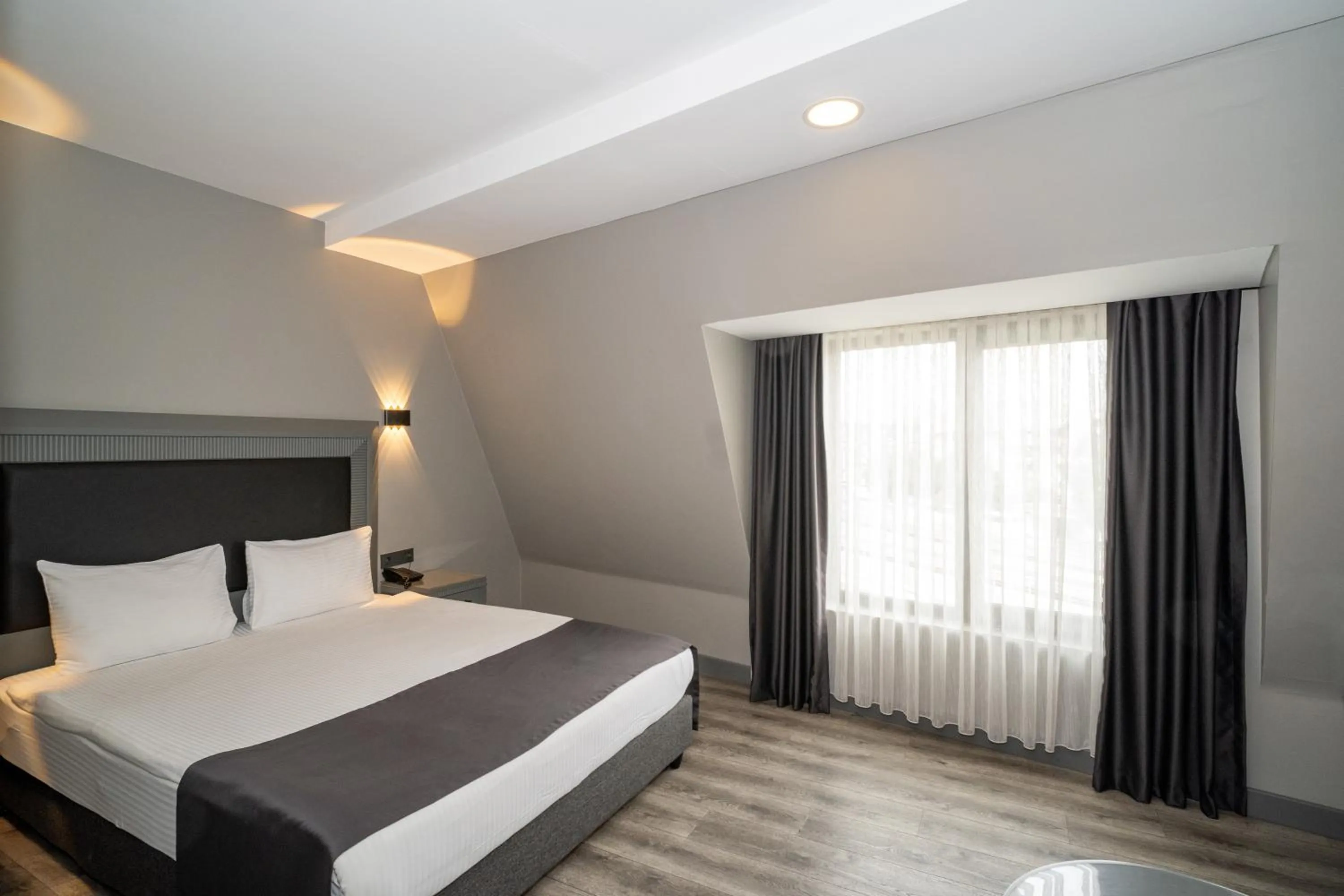 Bed in Grand S Hotel