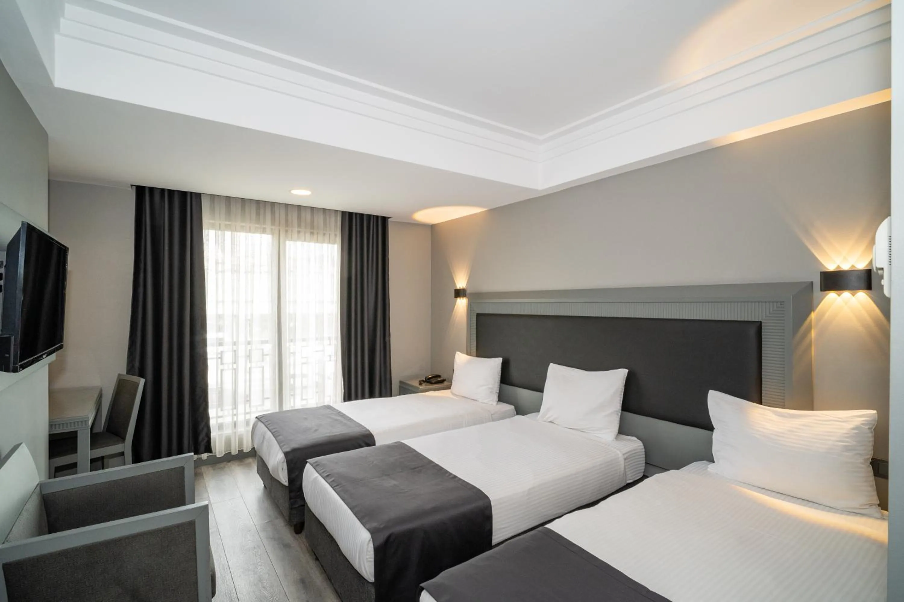 Bed in Grand S Hotel