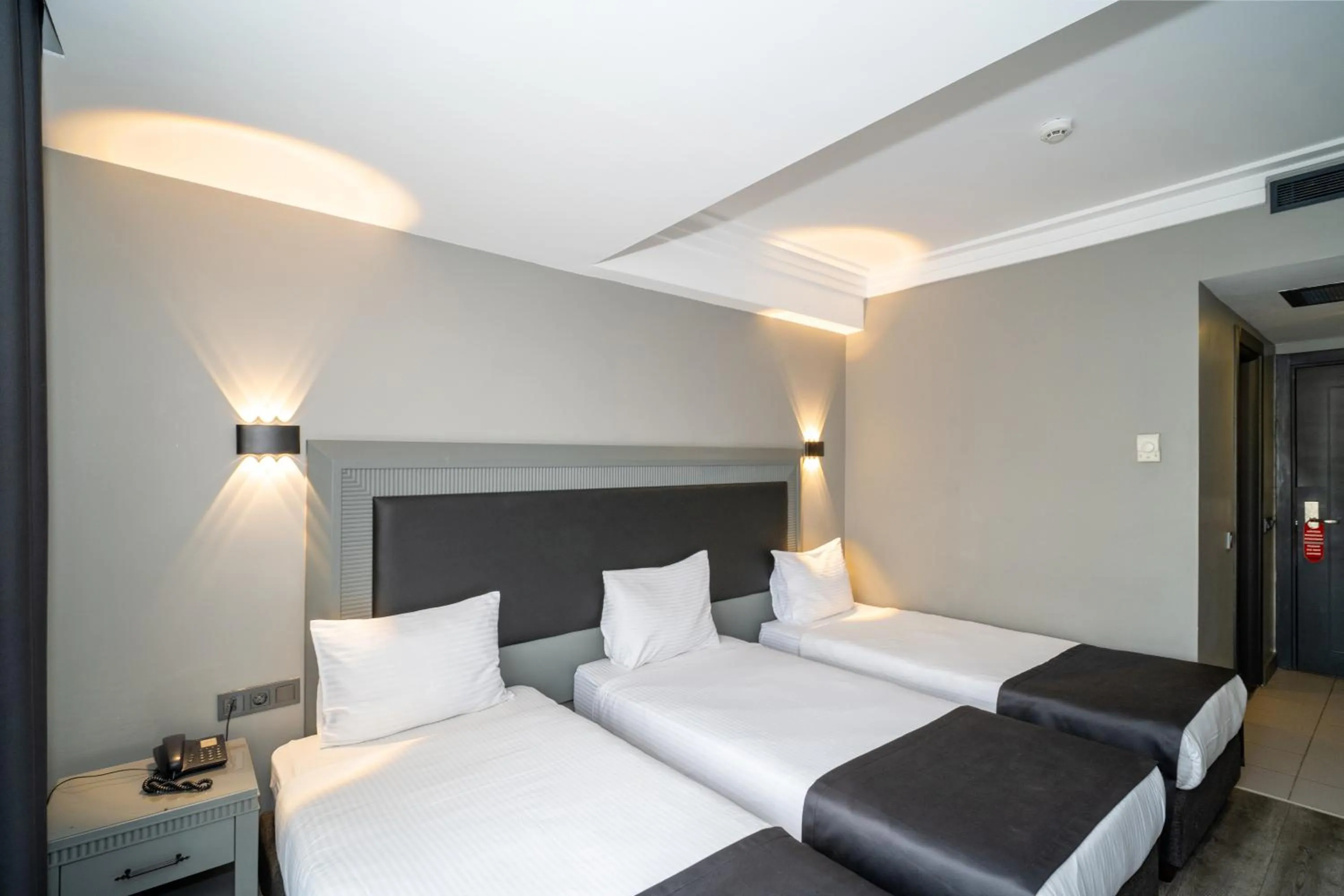 Bed in Grand S Hotel