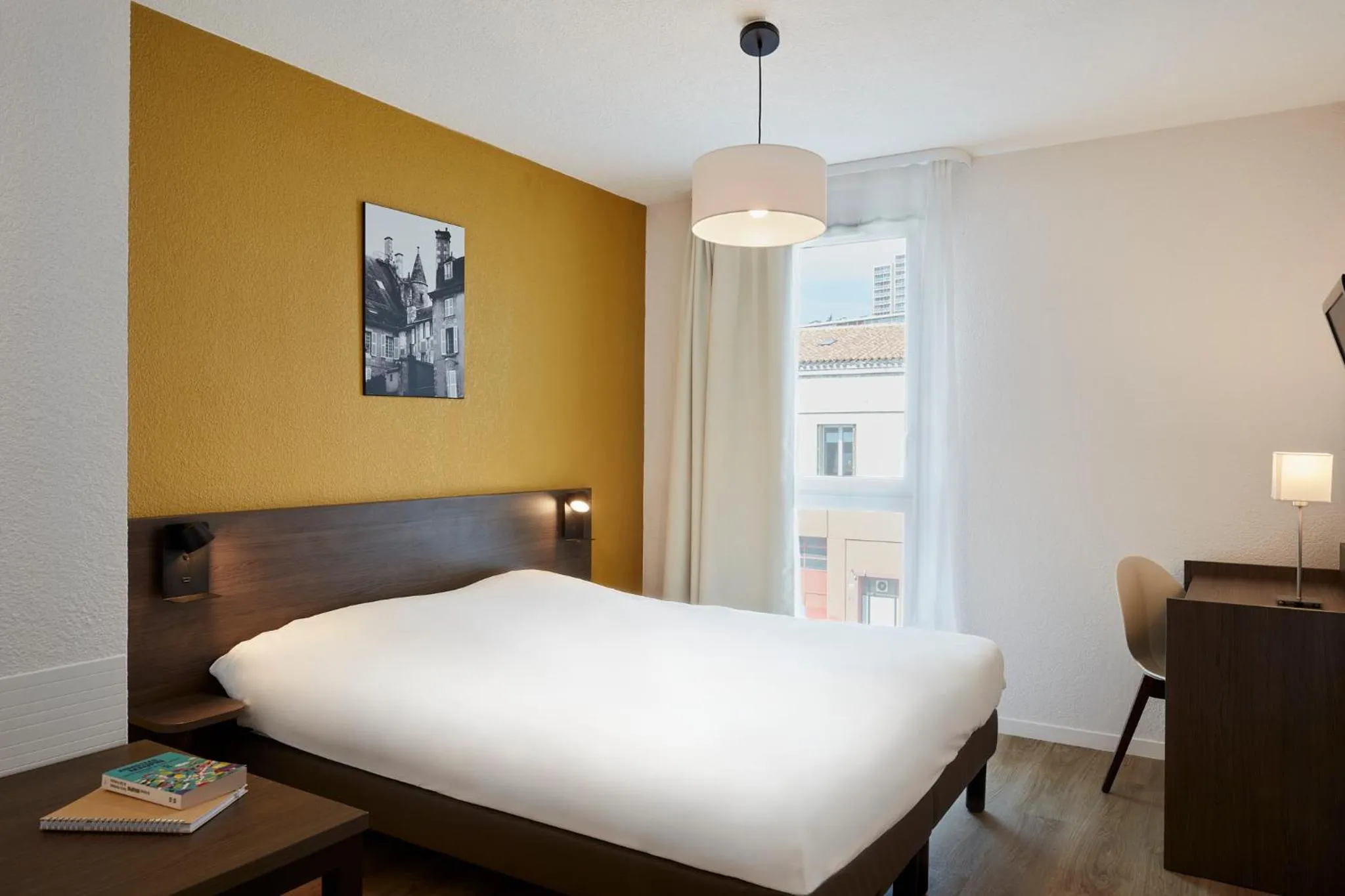 Photo of the whole room, Bed in Aparthotel Adagio Access Poitiers