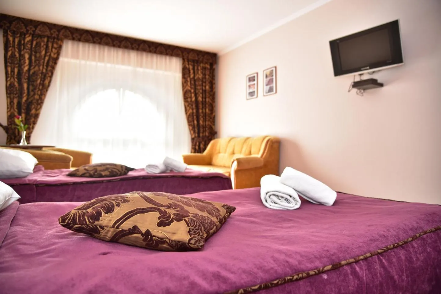 Communal lounge/ TV room, Bed in Gościniec Kaszubski