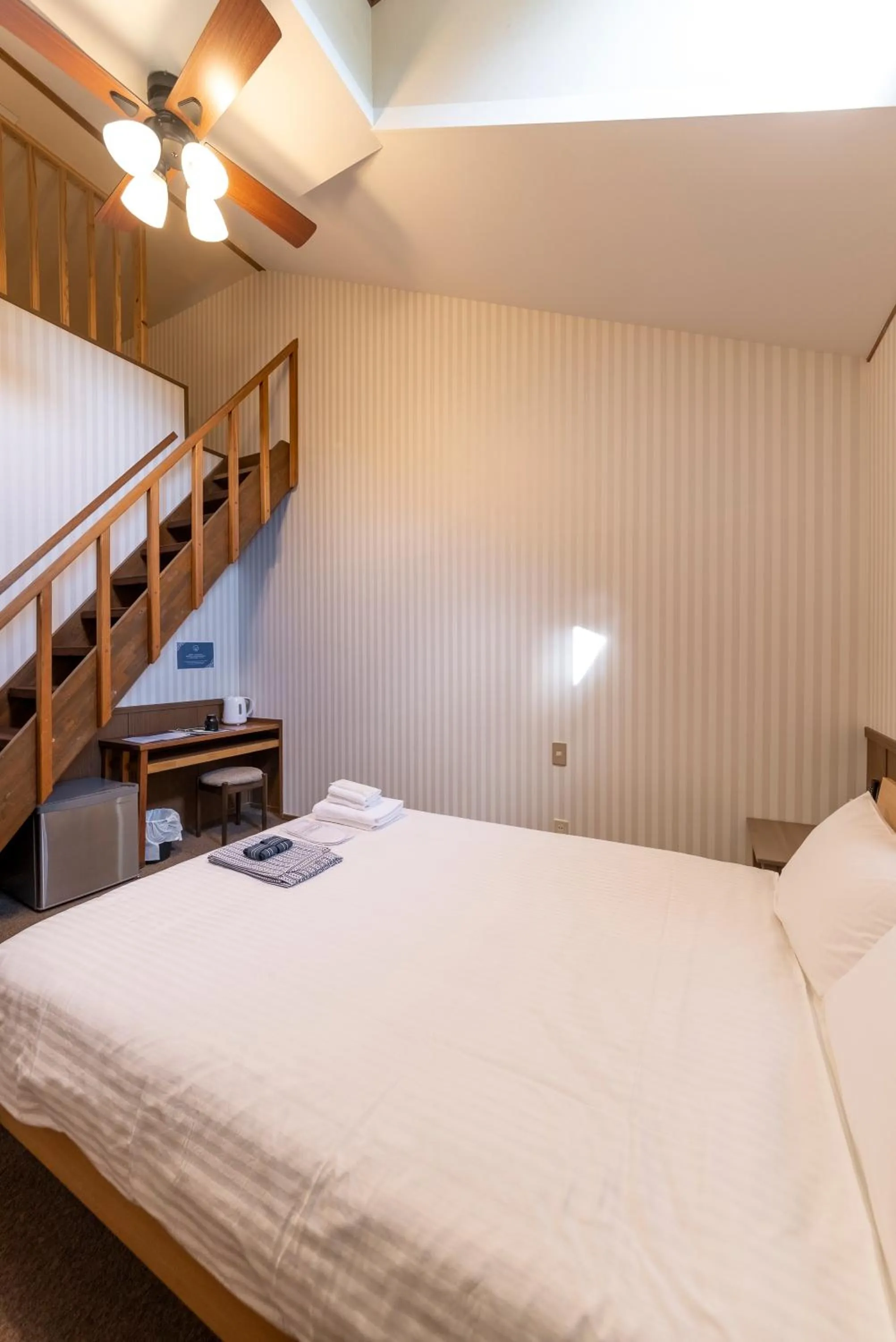 Photo of the whole room, Bed in ETAVIA Yufuin Kinrinko