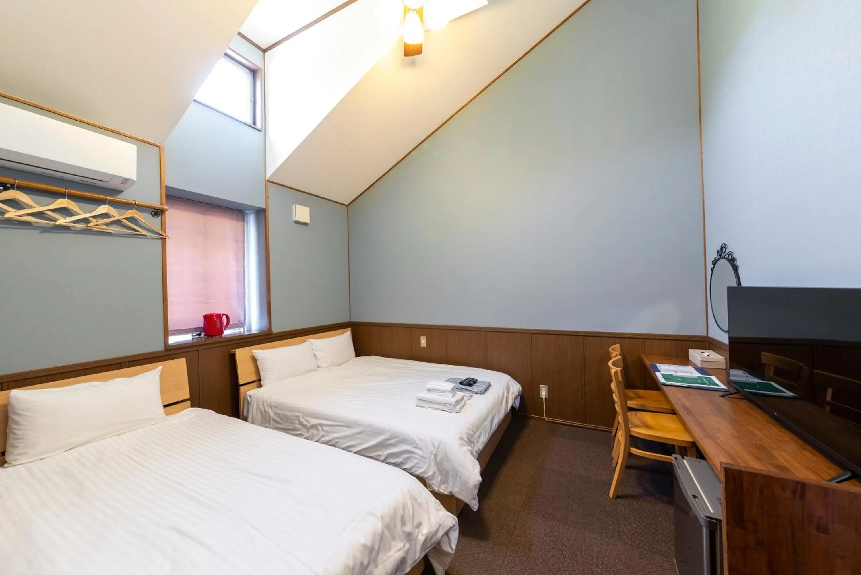 Photo of the whole room, Bed in ETAVIA Yufuin Kinrinko